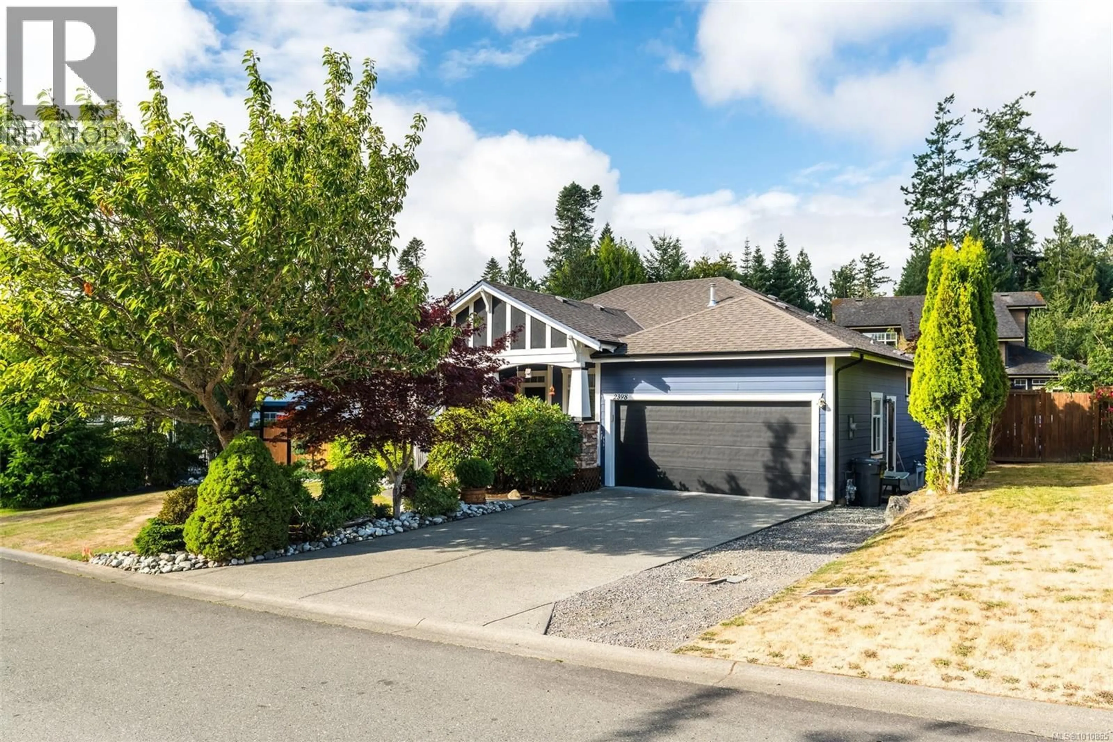 Home with vinyl exterior material, street for 2398 POPLAR DRIVE, Sooke British Columbia V9Z0Y5