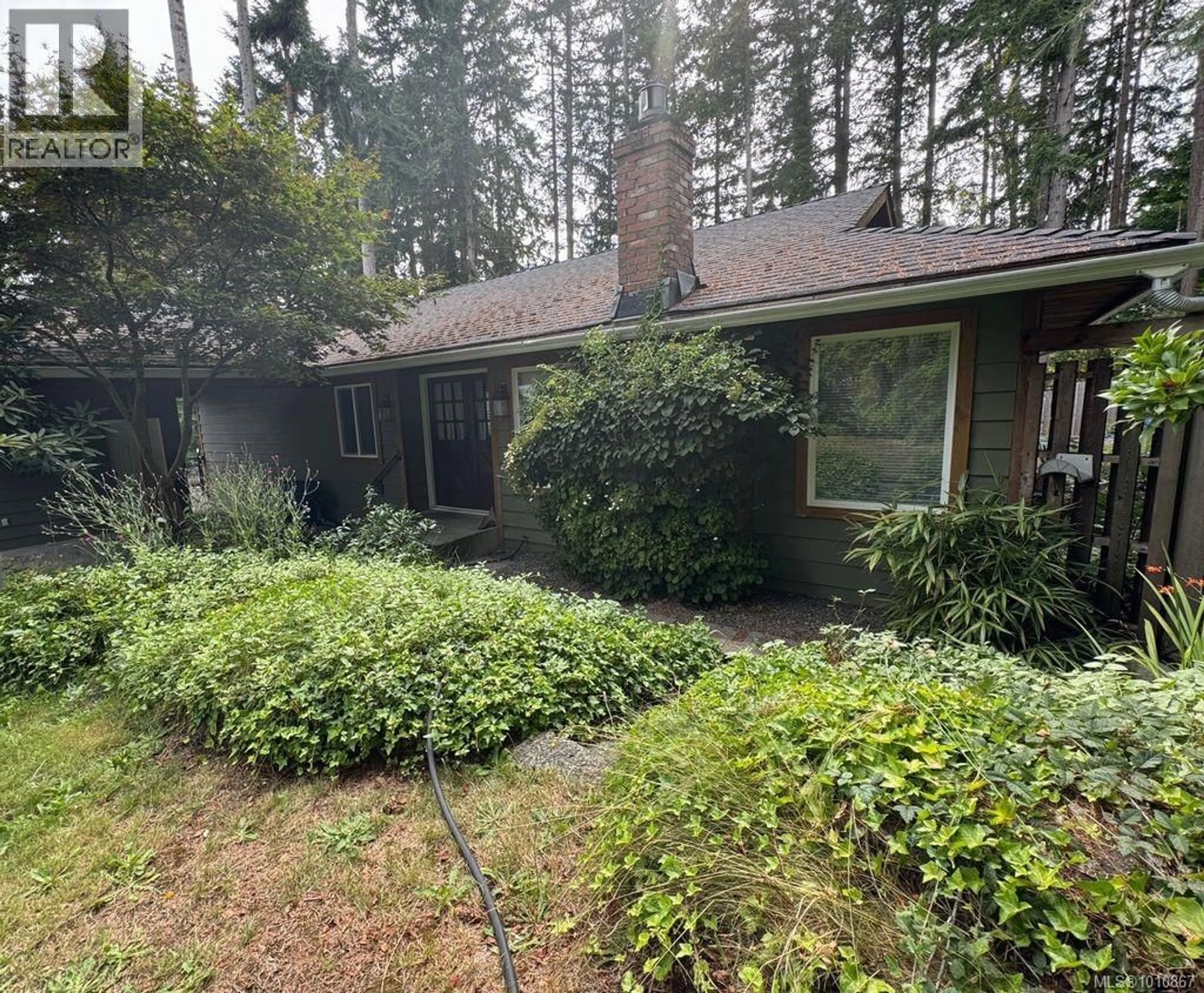 A pic from outside/outdoor area/front of a property/back of a property/a pic from drone, forest/trees view for 254 FAWN ROAD, Campbell River British Columbia V9W5L7