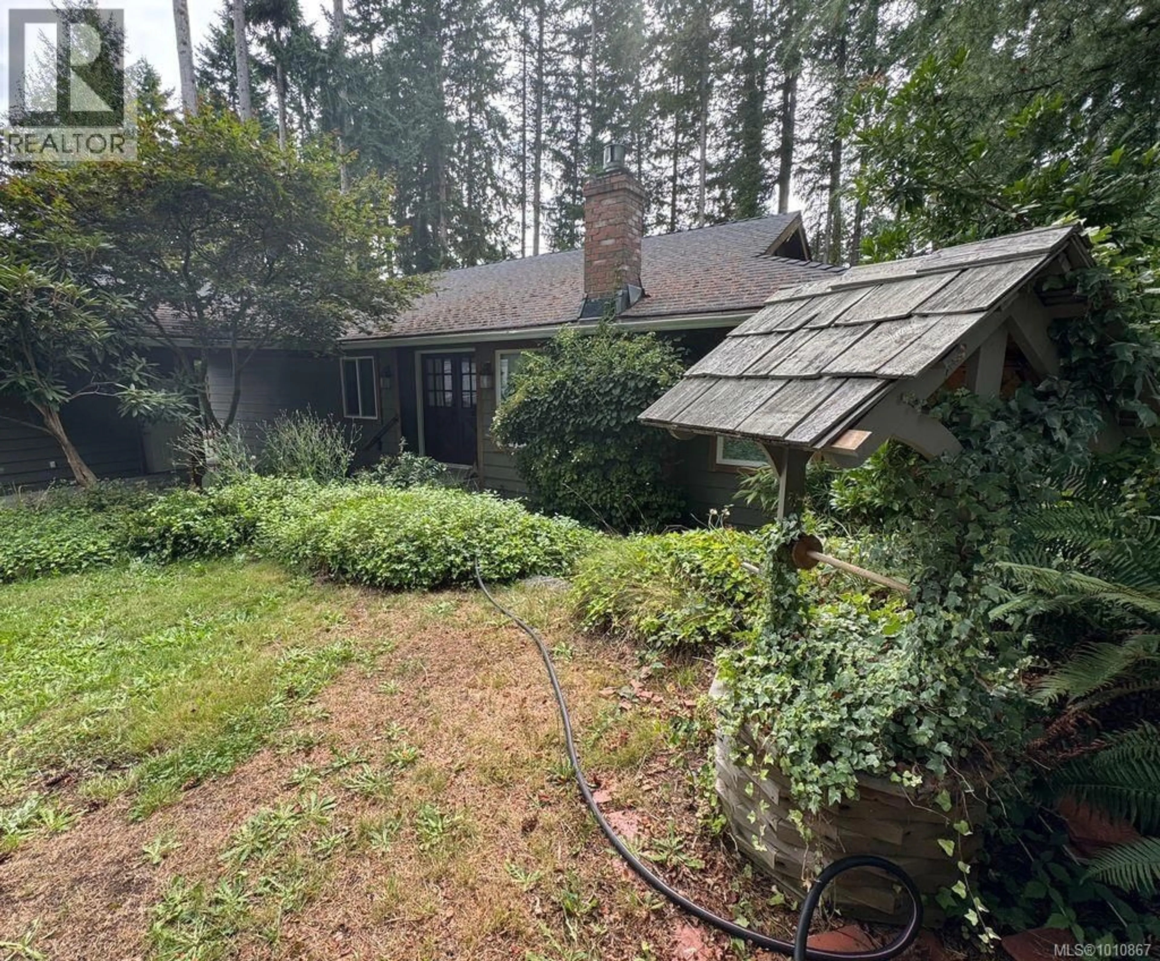 A pic from outside/outdoor area/front of a property/back of a property/a pic from drone, forest/trees view for 254 FAWN ROAD, Campbell River British Columbia V9W5L7