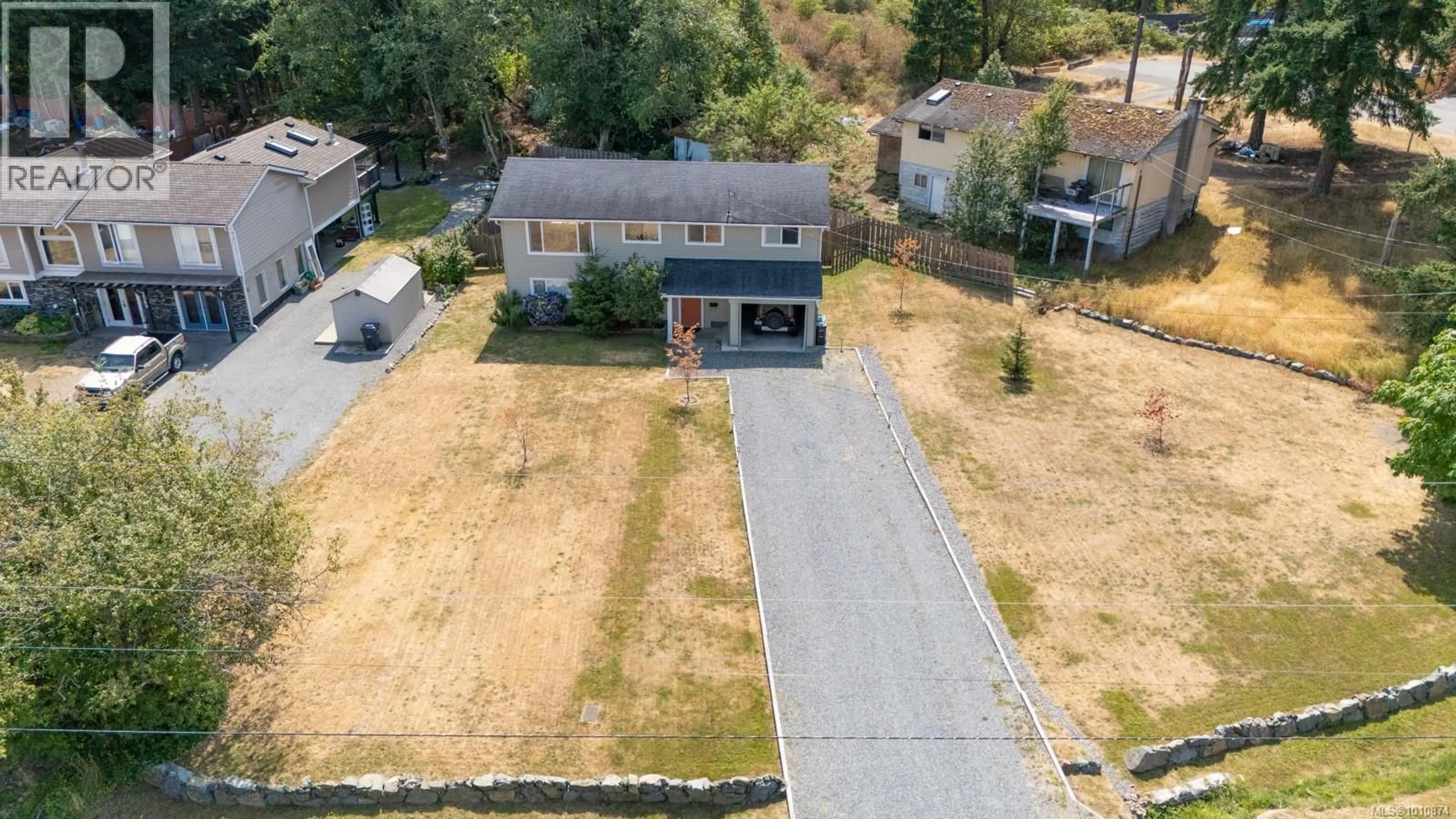 A pic from outside/outdoor area/front of a property/back of a property/a pic from drone, street for 2591 ROSSTOWN ROAD, Nanaimo British Columbia V9T3R9
