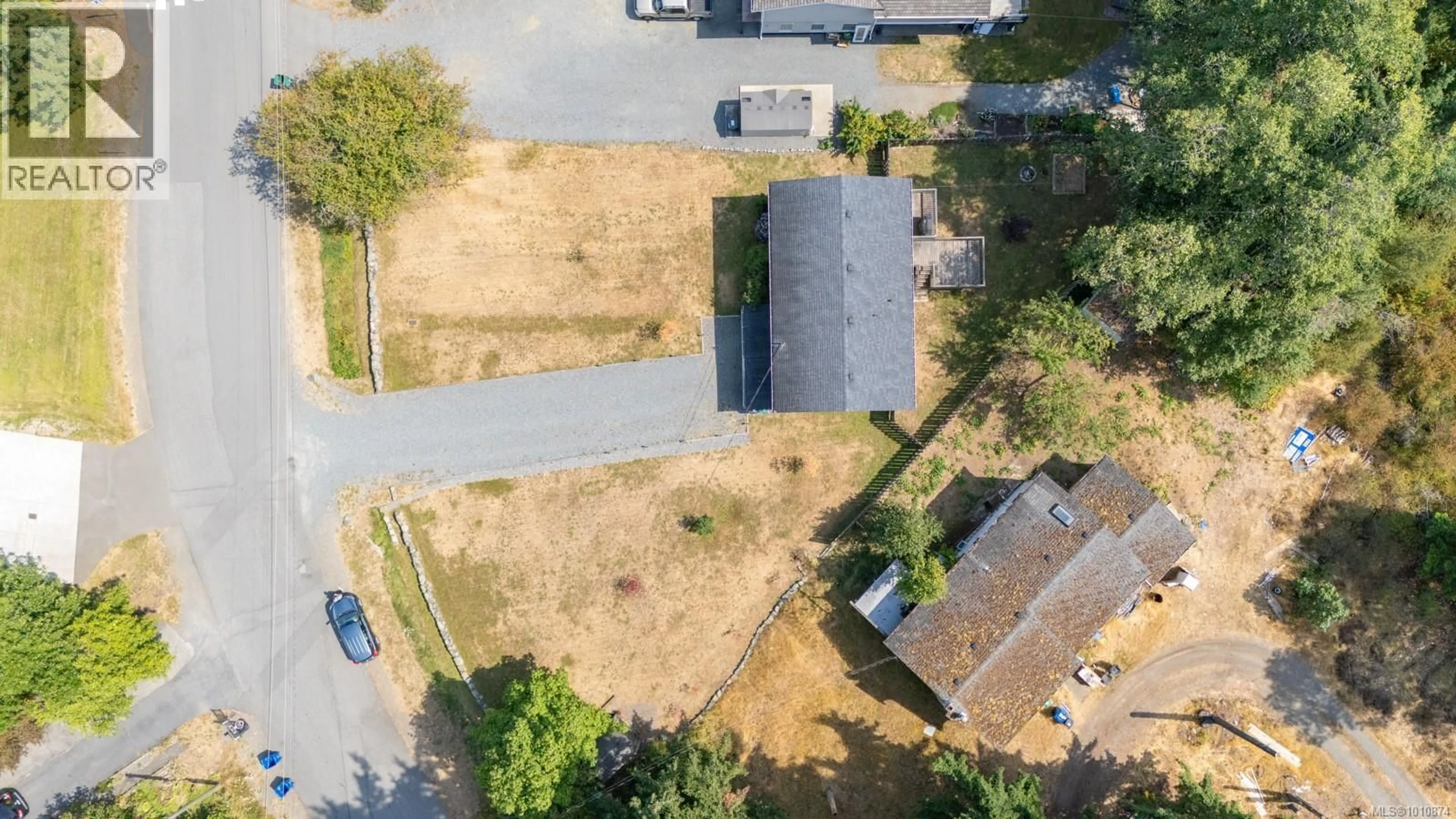 A pic from outside/outdoor area/front of a property/back of a property/a pic from drone, street for 2591 ROSSTOWN ROAD, Nanaimo British Columbia V9T3R9
