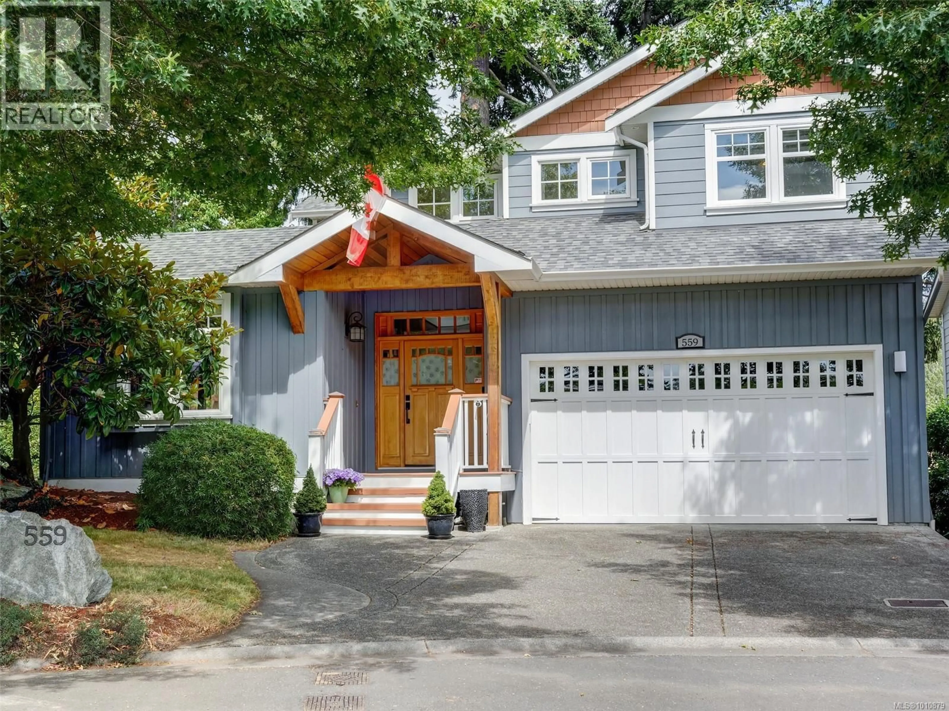 Home with vinyl exterior material, street for 559 CASELTON PLACE, Saanich British Columbia V8Z7Y5