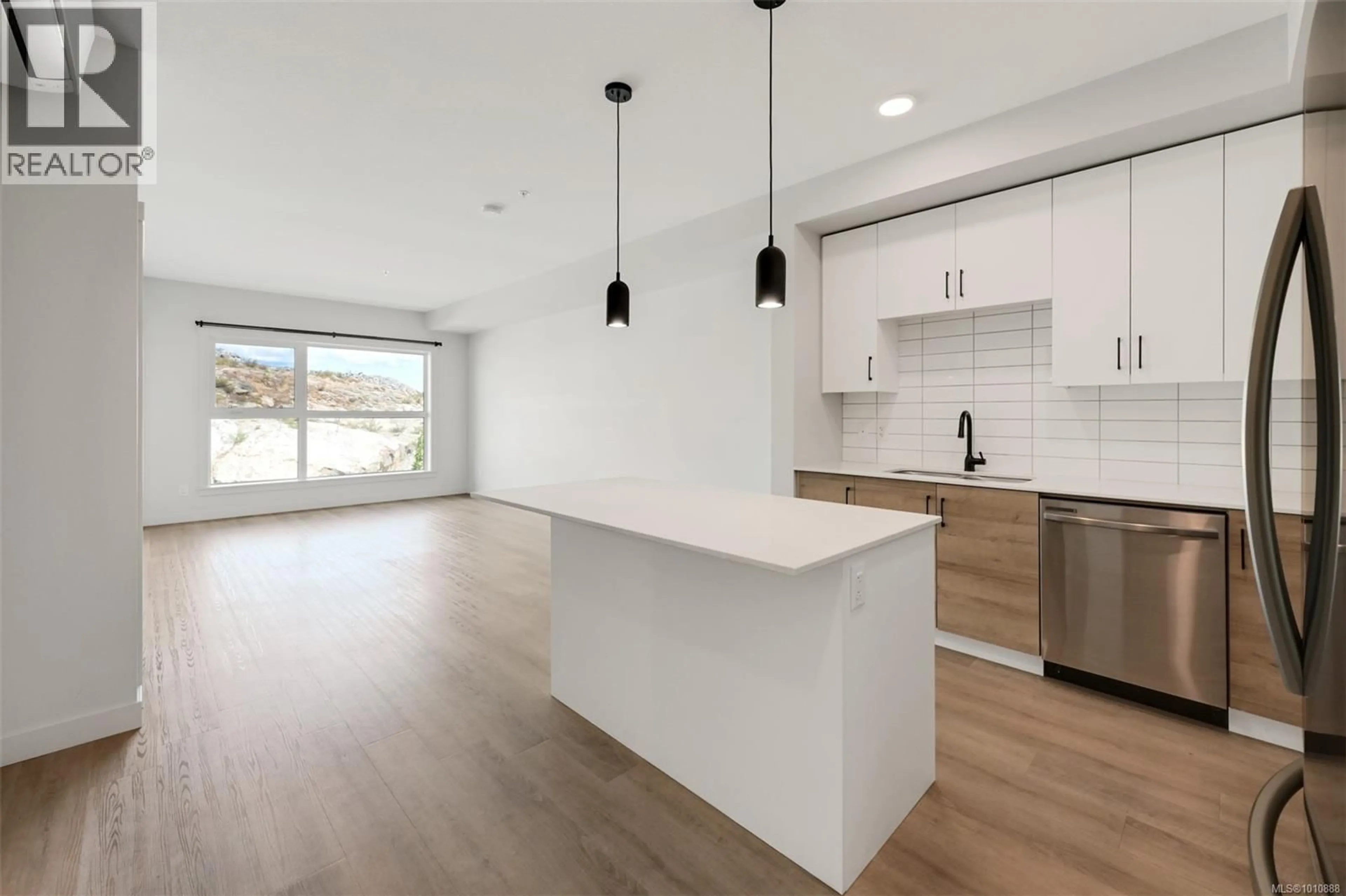 Open concept kitchen, unknown for 303 - 2461 GATEWAY ROAD, Langford British Columbia V9B6M6