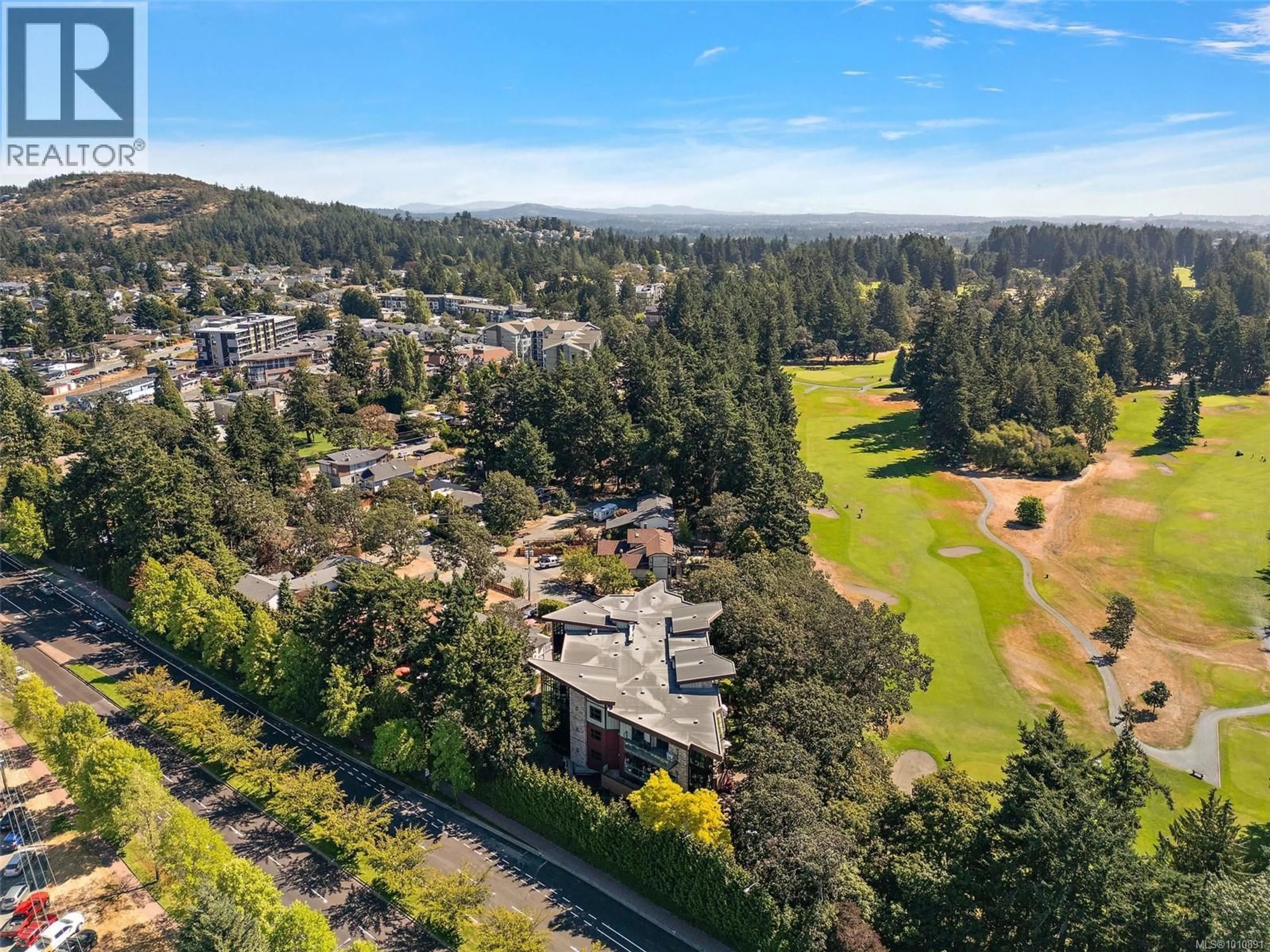 A pic from outside/outdoor area/front of a property/back of a property/a pic from drone, mountain view for 306 - 2850 ALDWYND ROAD, Langford British Columbia V9B3S7