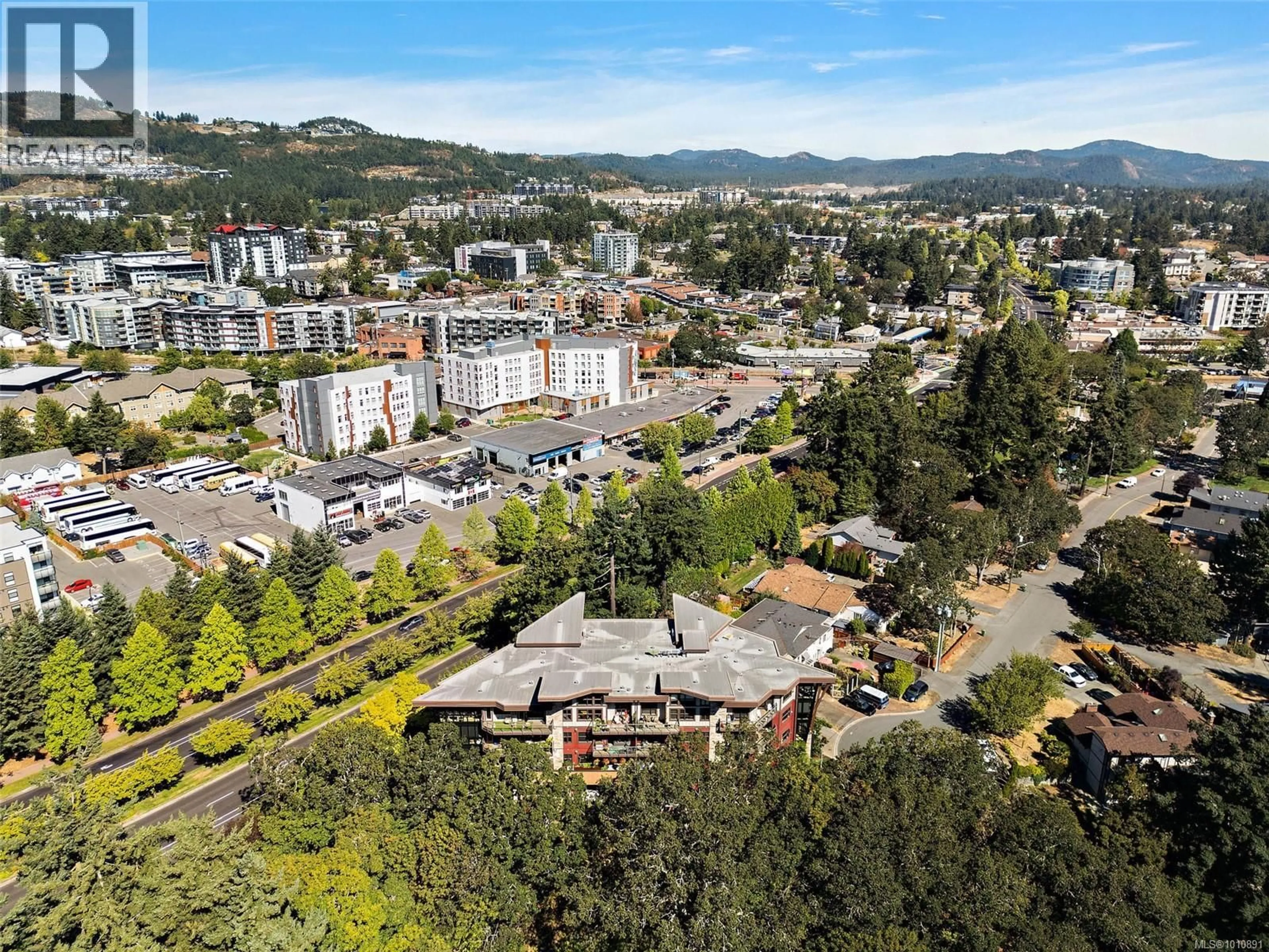 A pic from outside/outdoor area/front of a property/back of a property/a pic from drone, mountain view for 306 - 2850 ALDWYND ROAD, Langford British Columbia V9B3S7
