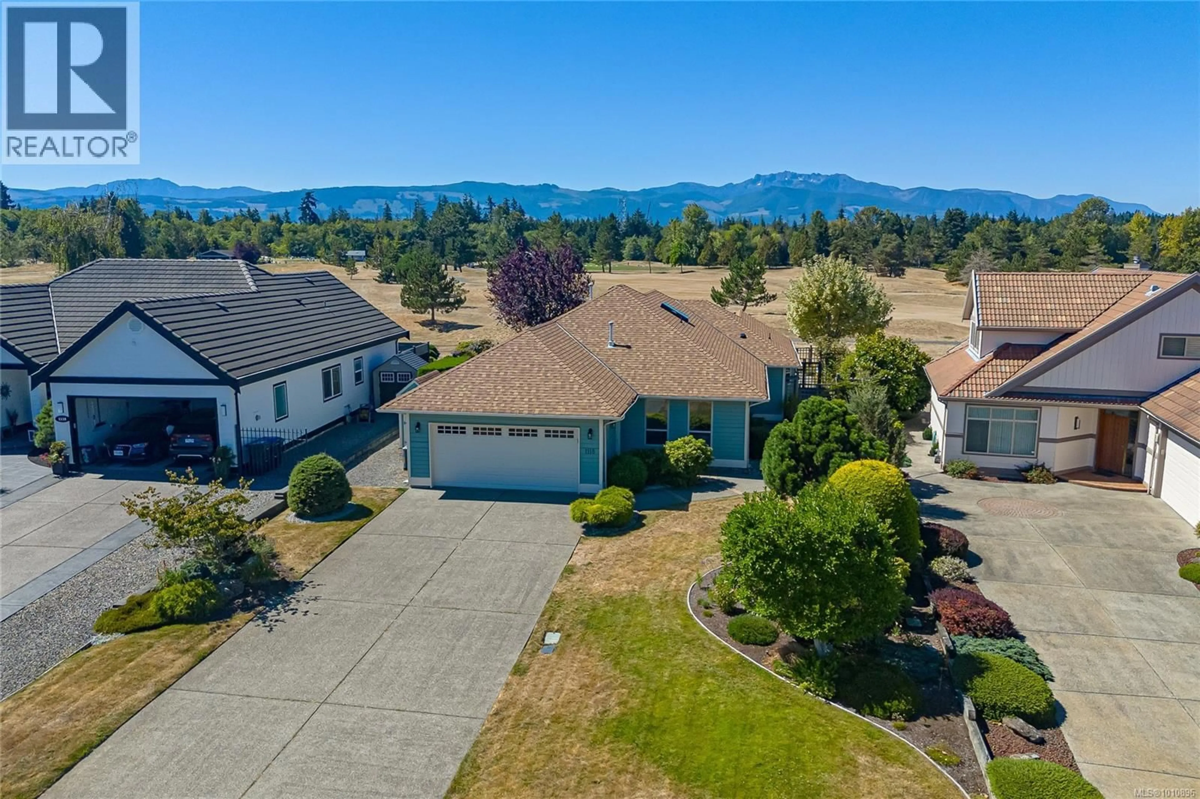 A pic from outside/outdoor area/front of a property/back of a property/a pic from drone, mountain view for 1118 ROBERTON BOULEVARD, French Creek British Columbia V9P2R6