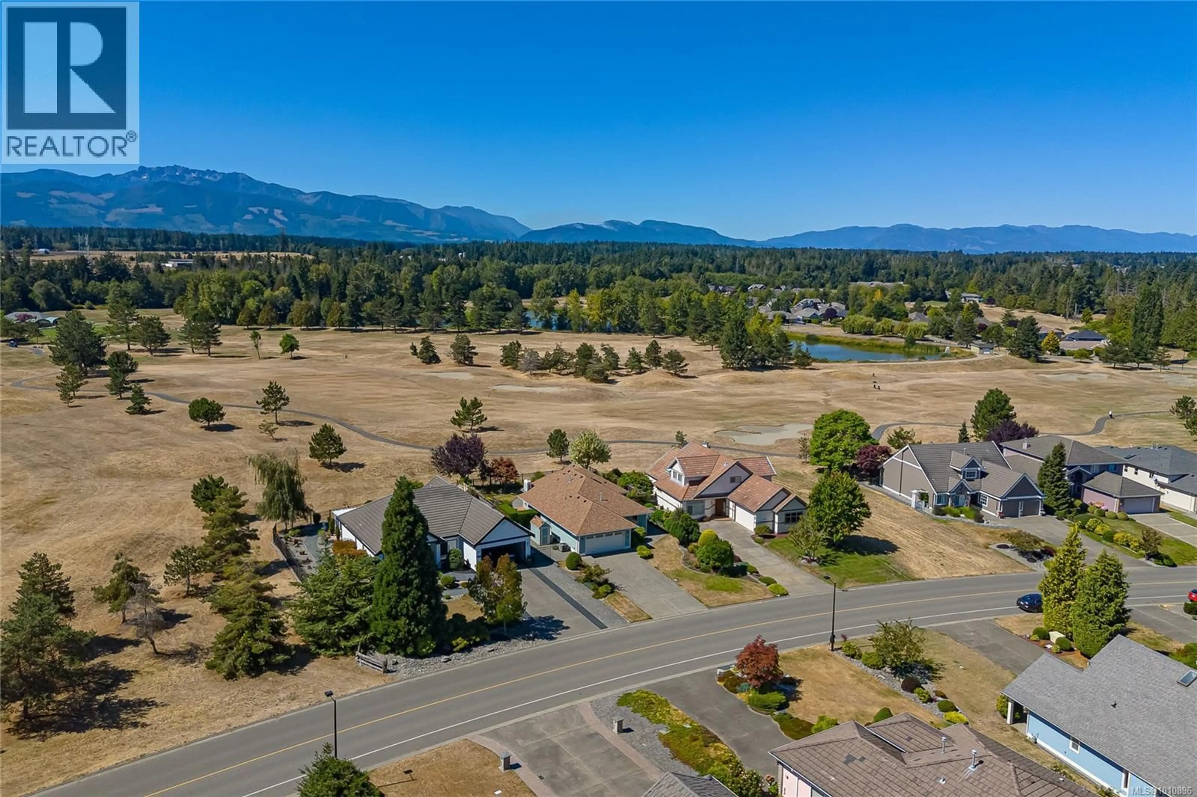 A pic from outside/outdoor area/front of a property/back of a property/a pic from drone, mountain view for 1118 ROBERTON BOULEVARD, French Creek British Columbia V9P2R6