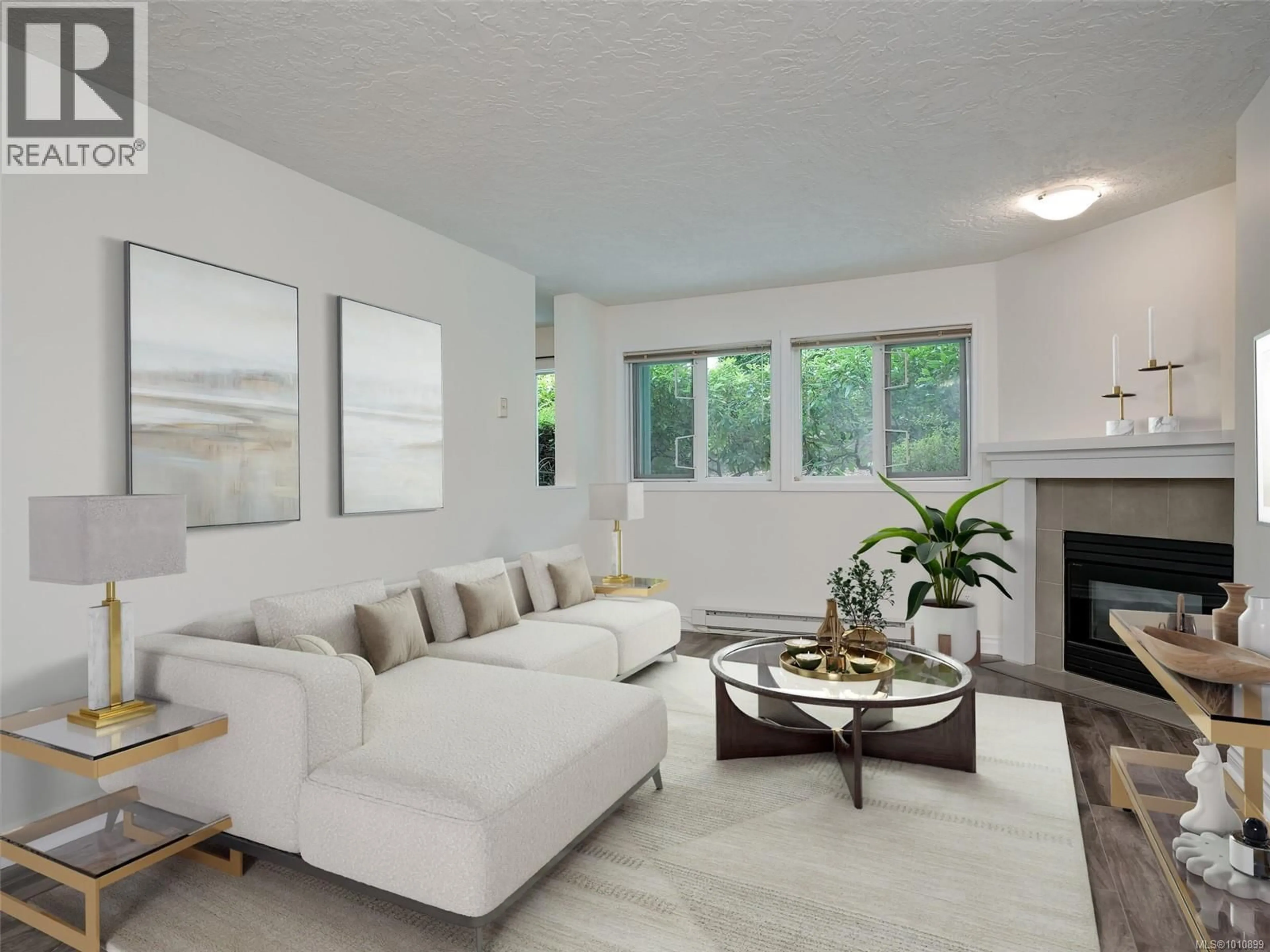 Living room with furniture, unknown for 104 - 494 MARSETT PLACE, Saanich British Columbia V8Z7J1