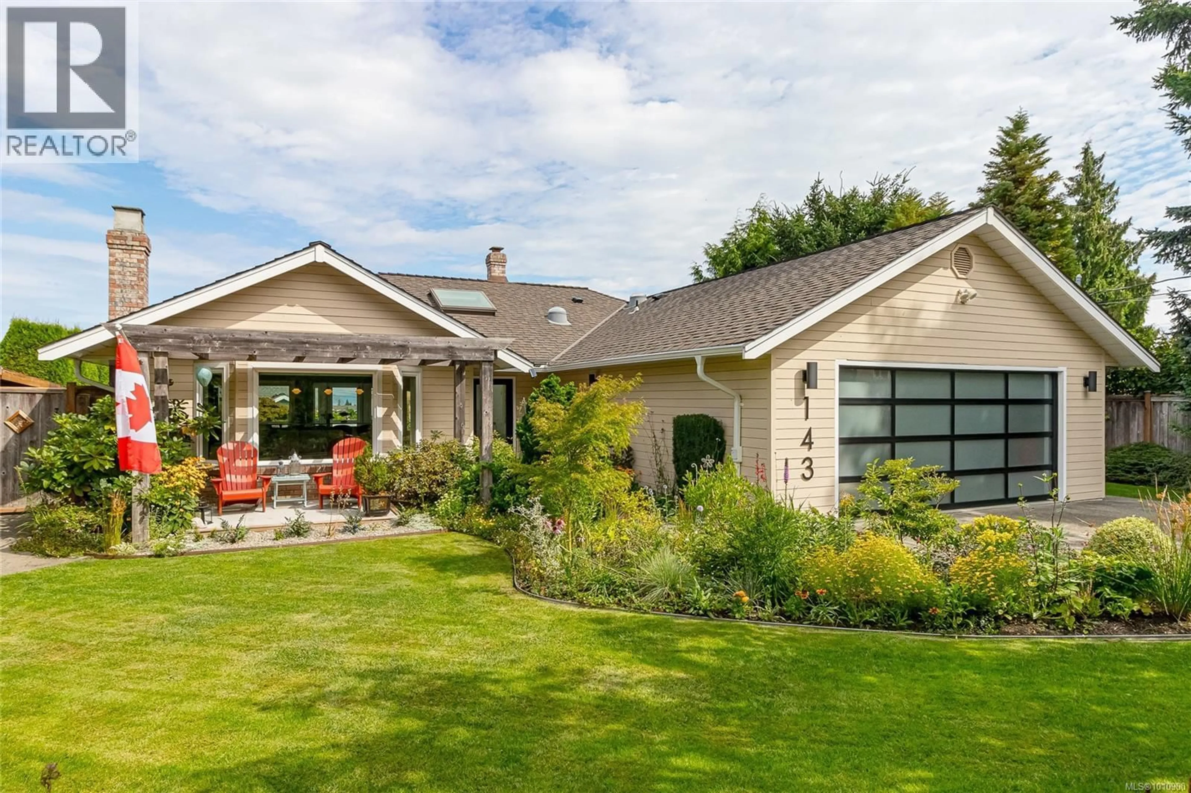 Home with brick exterior material, street for 143 DENMAN DRIVE, Qualicum Beach British Columbia V9K1R6