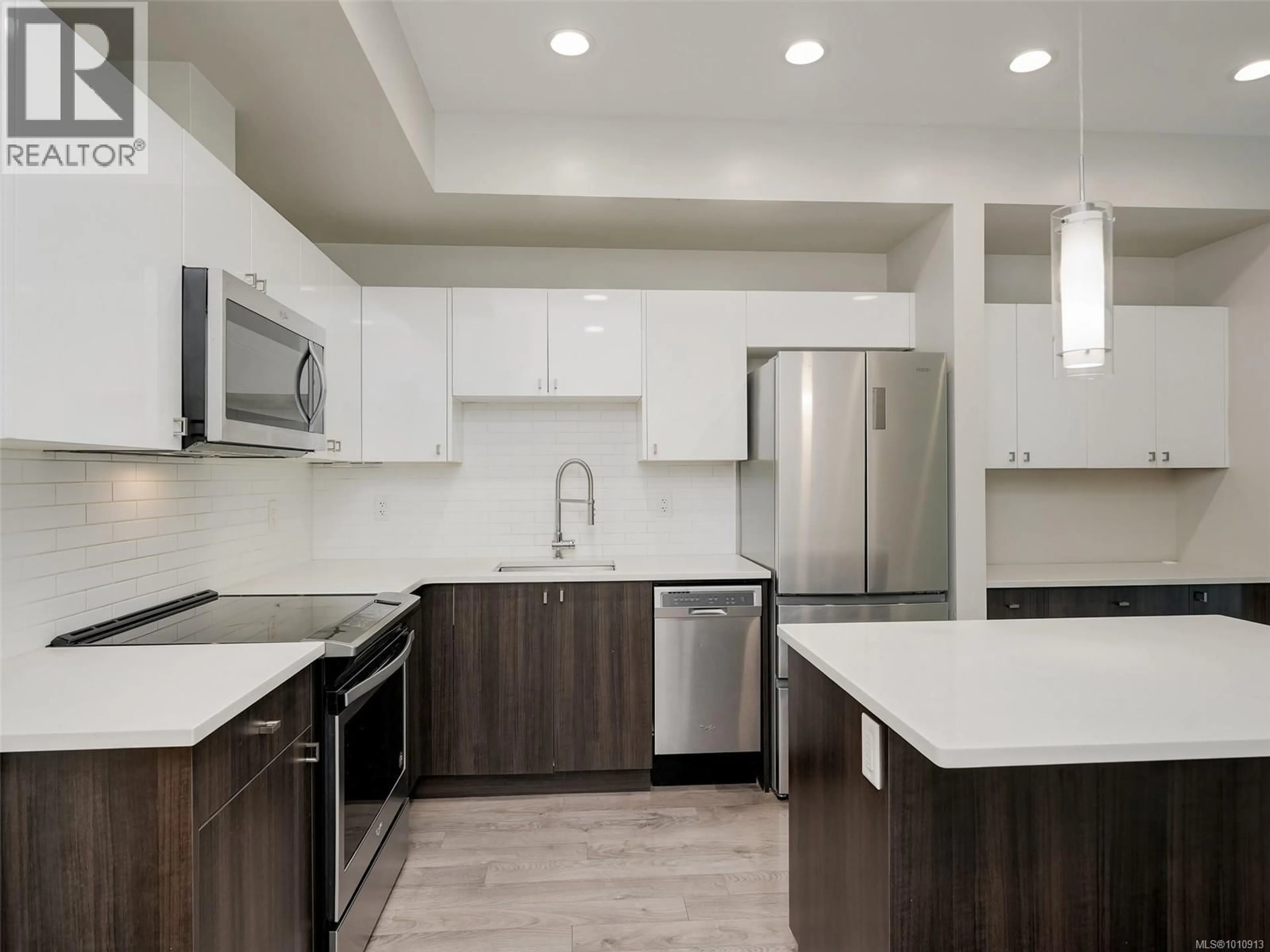 Open concept kitchen, ceramic/tile floor for 207 - 767 TYEE ROAD, Victoria British Columbia V9A0G5