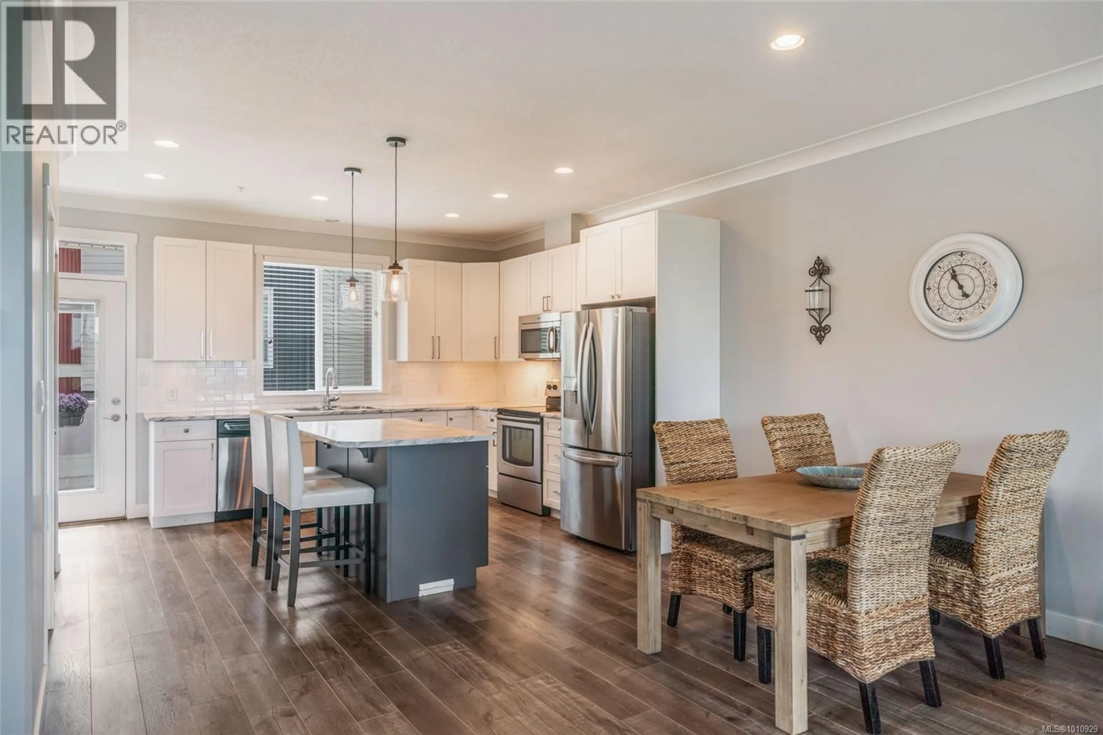 Open concept kitchen, wood/laminate floor for 4 - 6115 GLACIER WAY, Nanaimo British Columbia V9T0H8