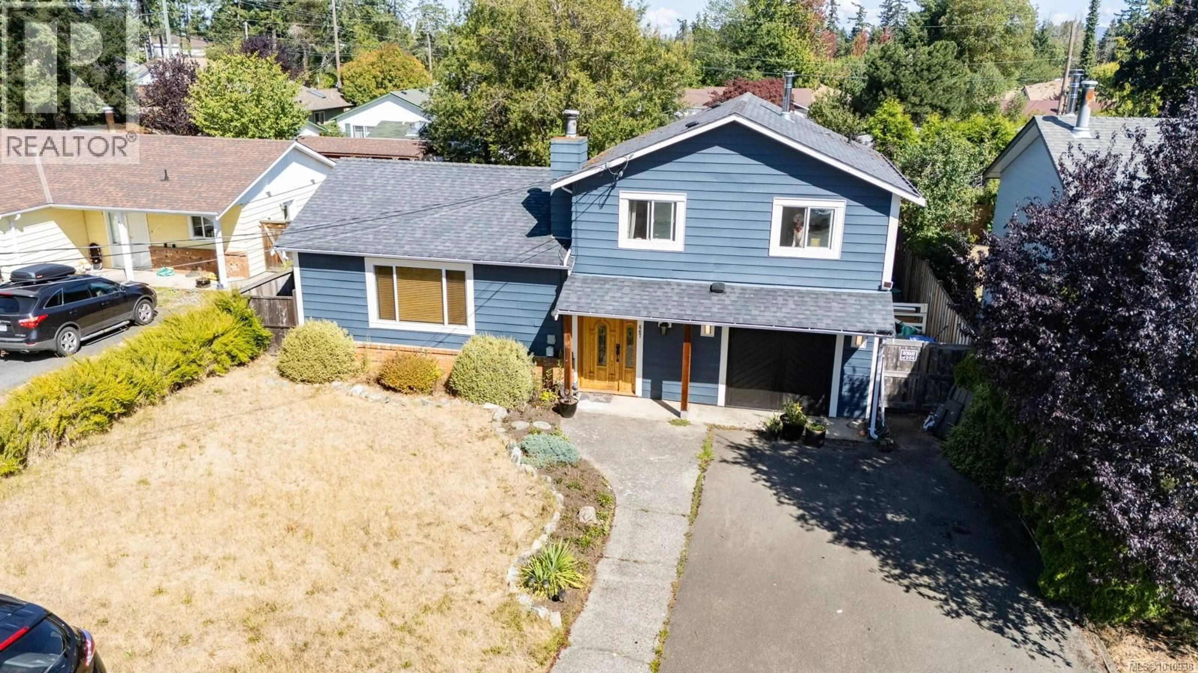 A pic from outside/outdoor area/front of a property/back of a property/a pic from drone, street for 667 BLENKIN AVENUE, Parksville British Columbia V9P1G7