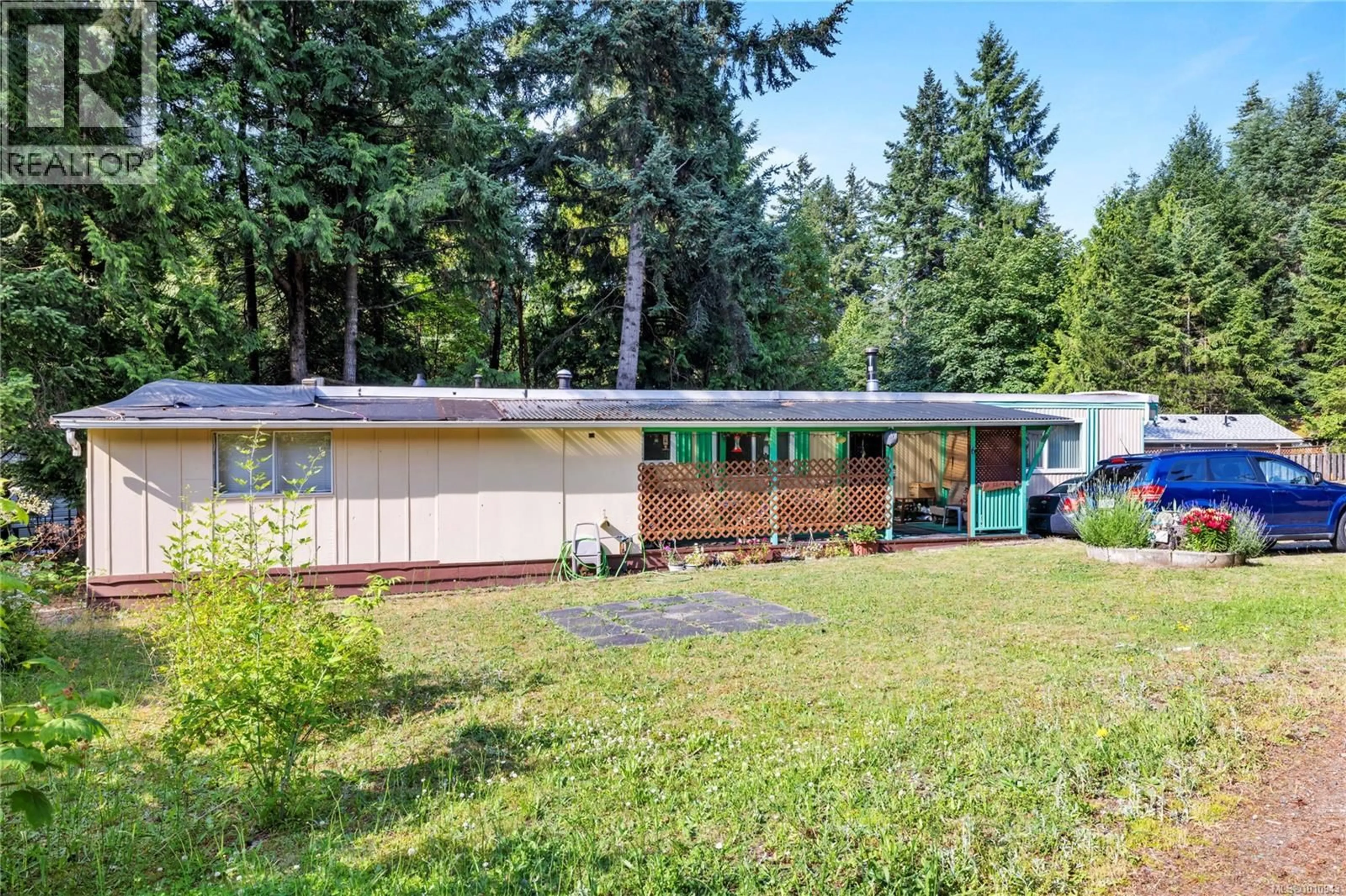 Home with vinyl exterior material, forest/trees view for 6 - 7071 LANTZVILLE ROAD, Lantzville British Columbia V0R2H0