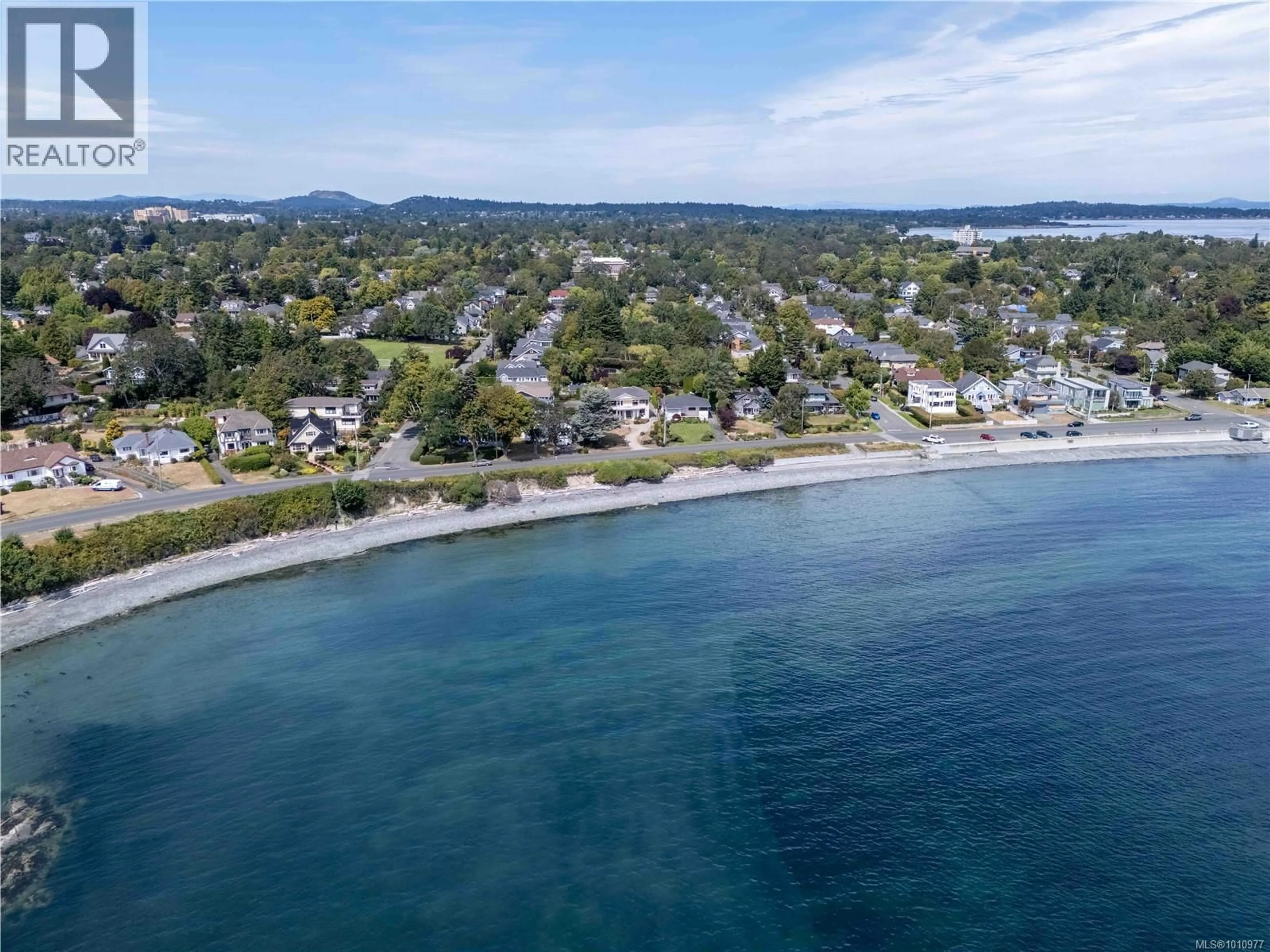 A pic from outside/outdoor area/front of a property/back of a property/a pic from drone, water/lake/river/ocean view for 320 BEACH DRIVE, Oak Bay British Columbia V8S2M2