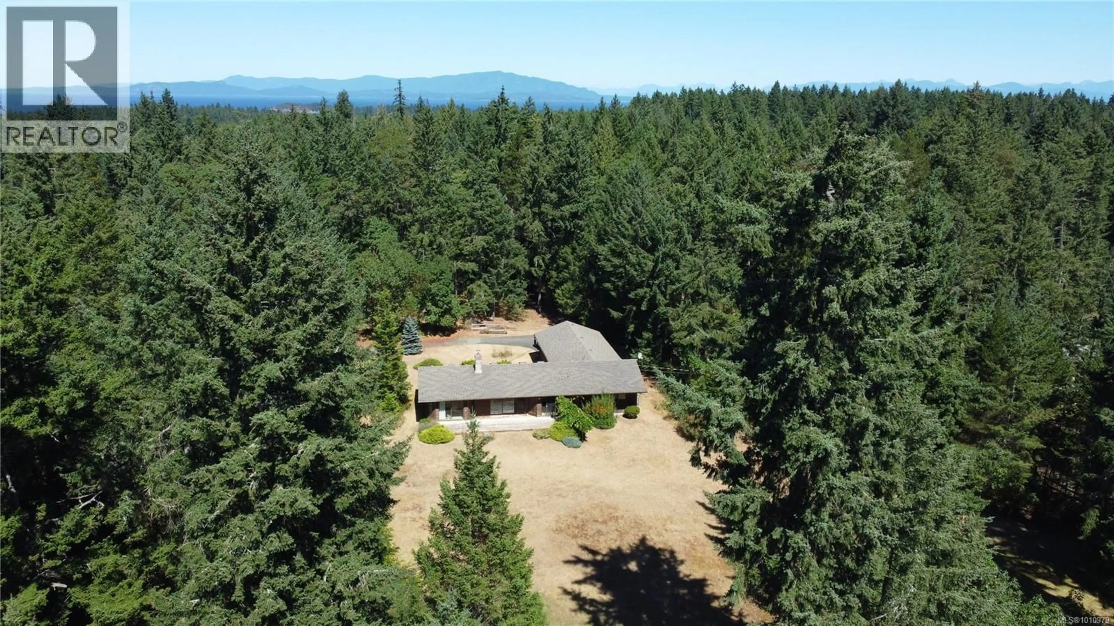 A pic from outside/outdoor area/front of a property/back of a property/a pic from drone, forest/trees view for 2175 SPURS PLACE, Nanoose Bay British Columbia V9P9C2