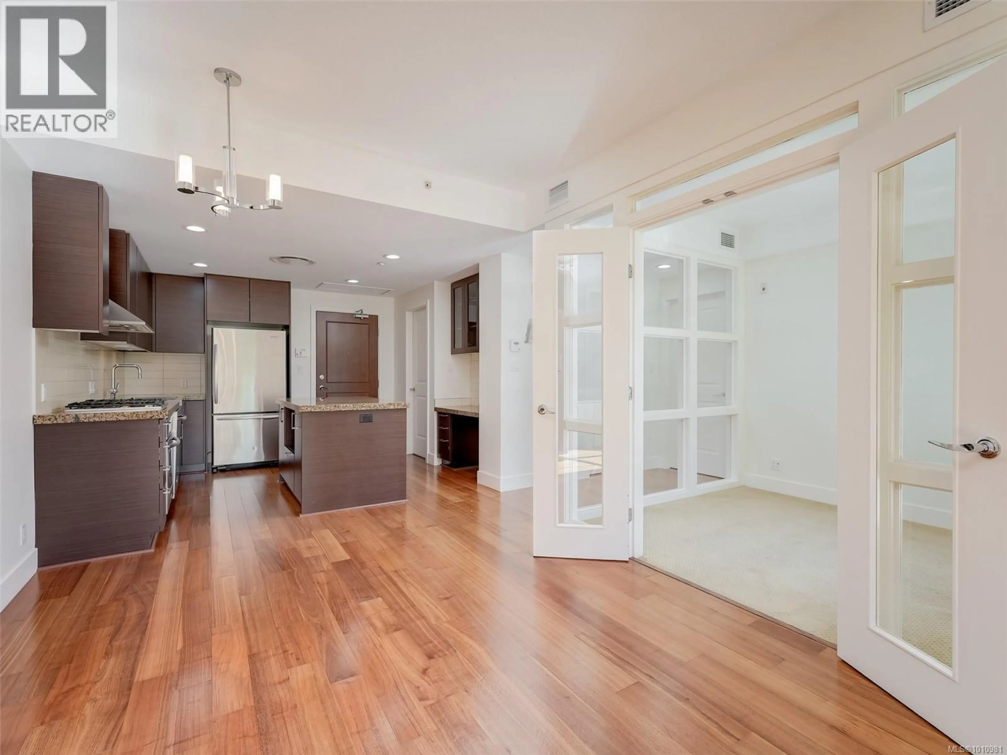 Open concept kitchen, wood/laminate floor for 218 - 1400 LYNBURNE PLACE, Langford British Columbia V9B0A4