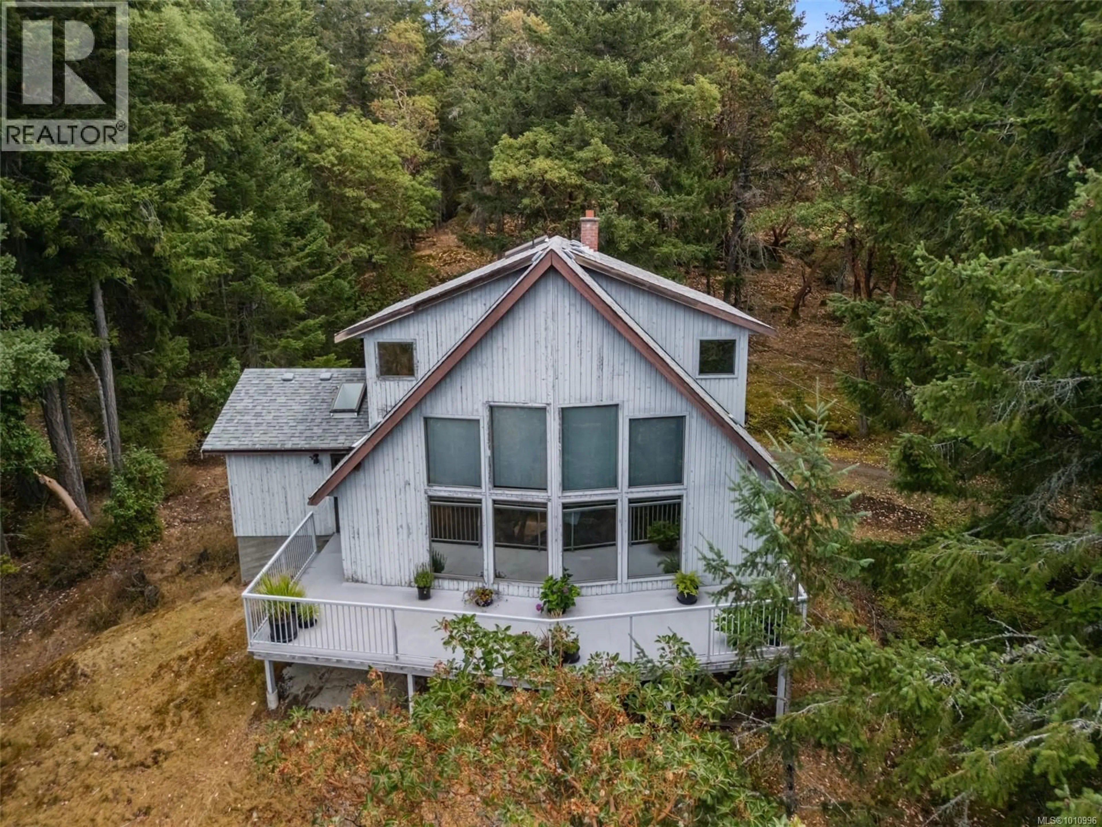 A pic from outside/outdoor area/front of a property/back of a property/a pic from drone, forest/trees view for 1618 DAVIES ROAD, Highlands British Columbia V9B6E8