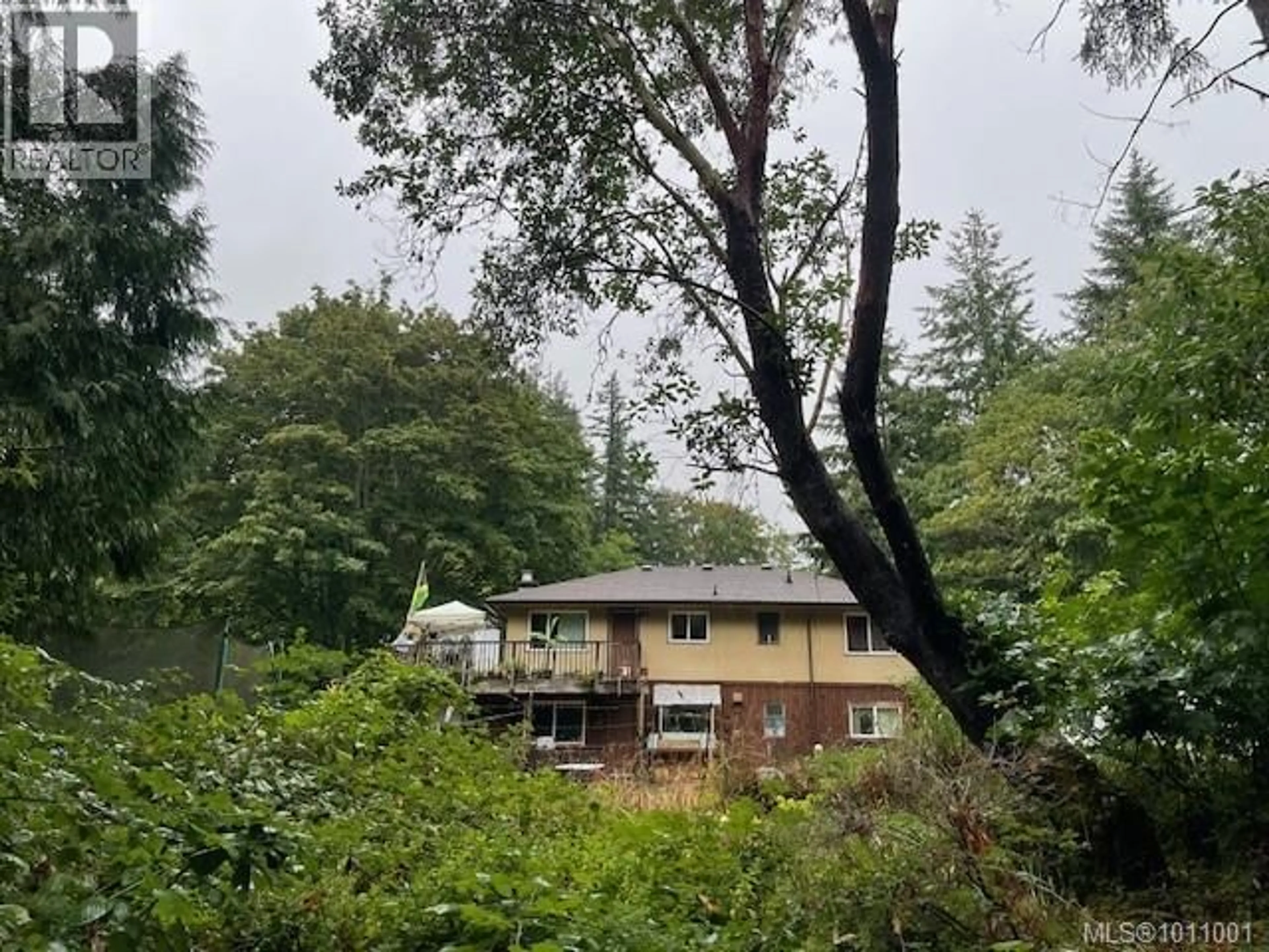 A pic from outside/outdoor area/front of a property/back of a property/a pic from drone, forest/trees view for 1753/1755 FULFORD-GANGES ROAD, Salt Spring British Columbia V8K2A5