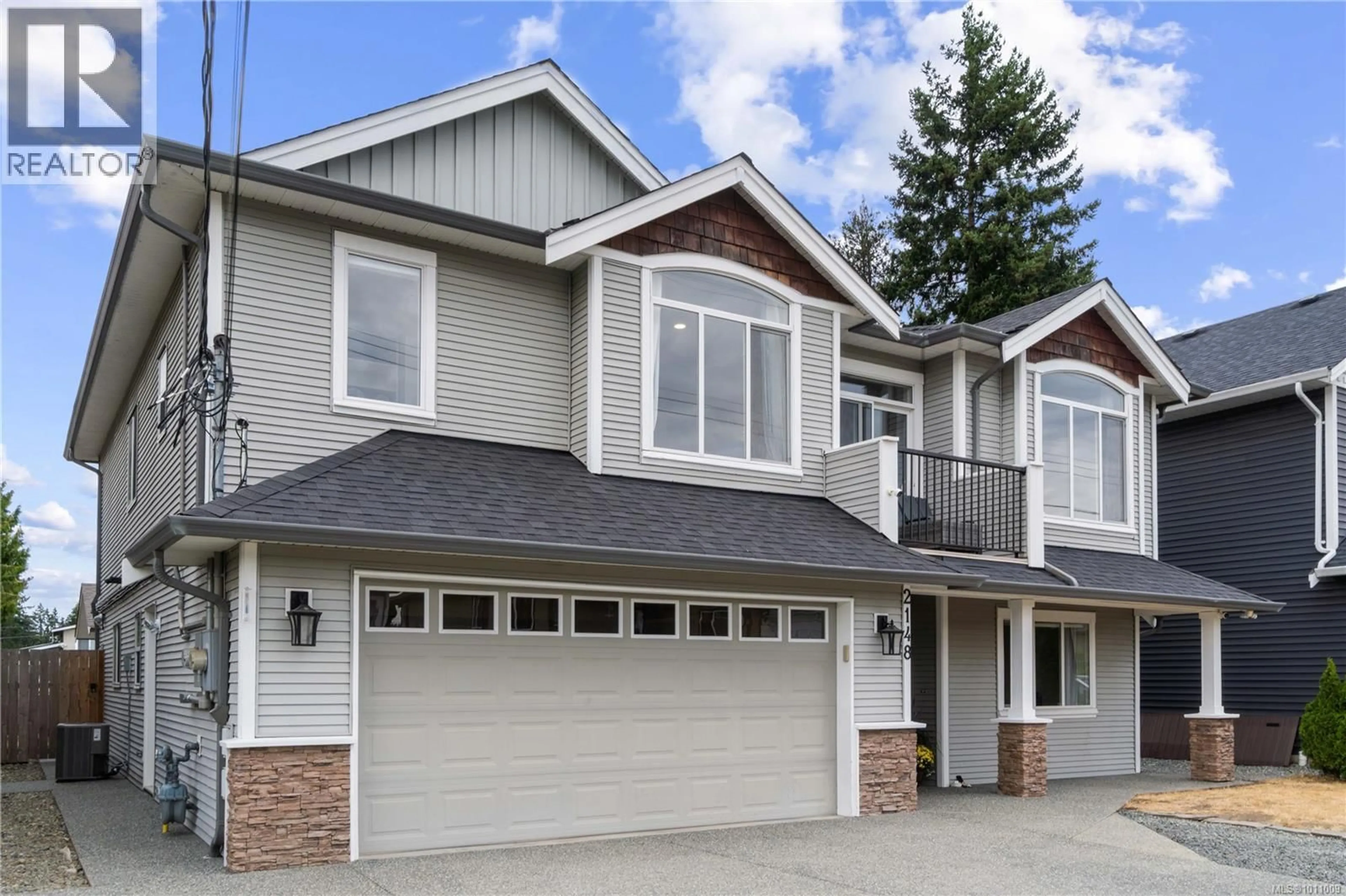 Home with vinyl exterior material, street for 2148 LARK CRESCENT, Nanaimo British Columbia V9S5J8