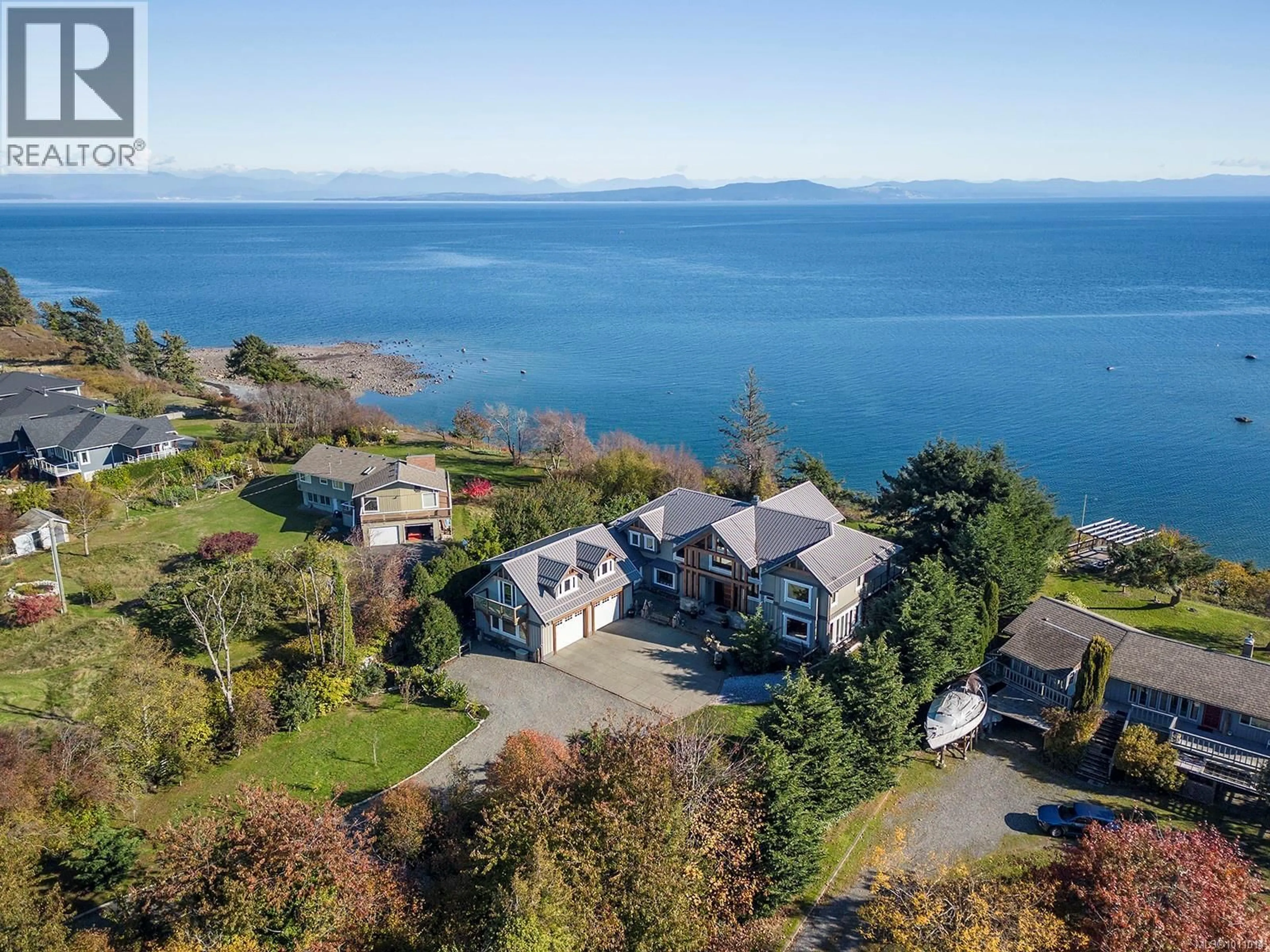 A pic from outside/outdoor area/front of a property/back of a property/a pic from drone, water/lake/river/ocean view for 1107 KYE BAY ROAD, Comox British Columbia V9M3T4