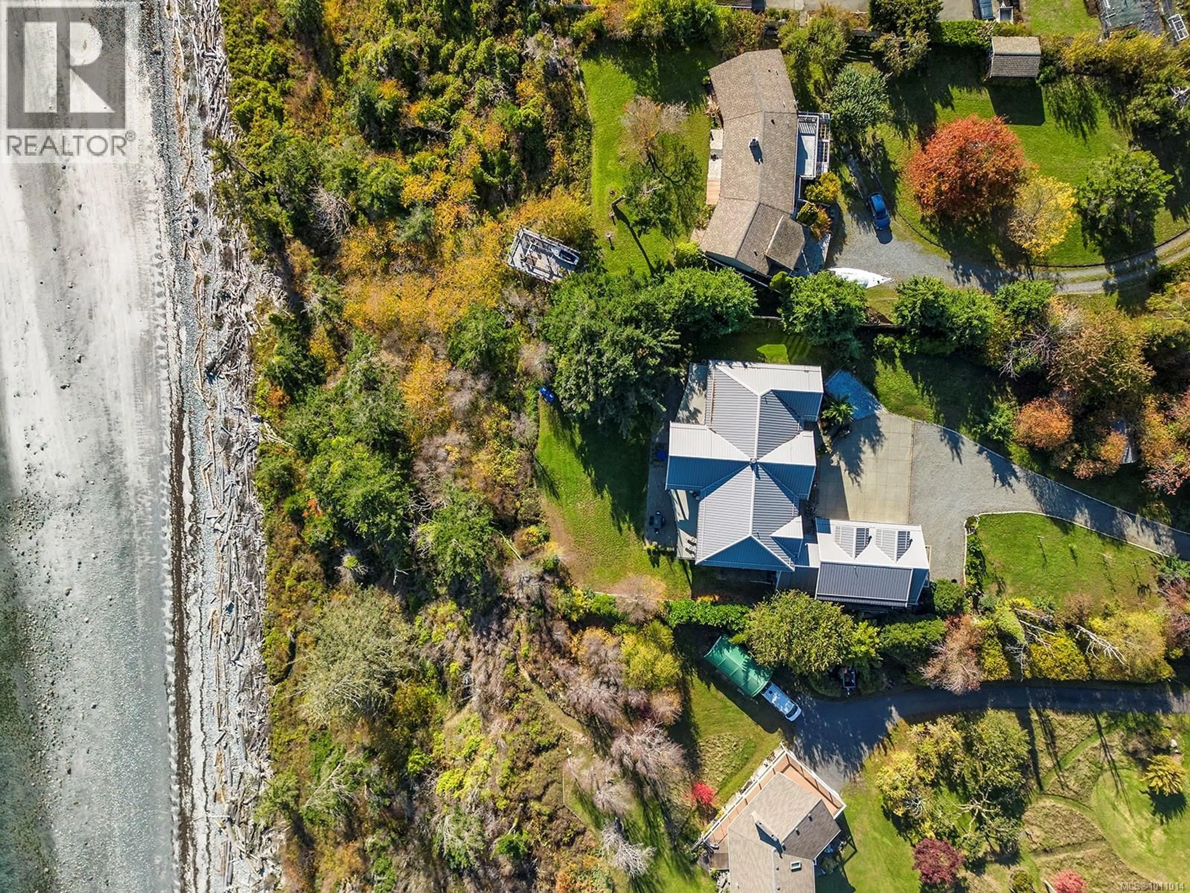 A pic from outside/outdoor area/front of a property/back of a property/a pic from drone, water/lake/river/ocean view for 1107 KYE BAY ROAD, Comox British Columbia V9M3T4