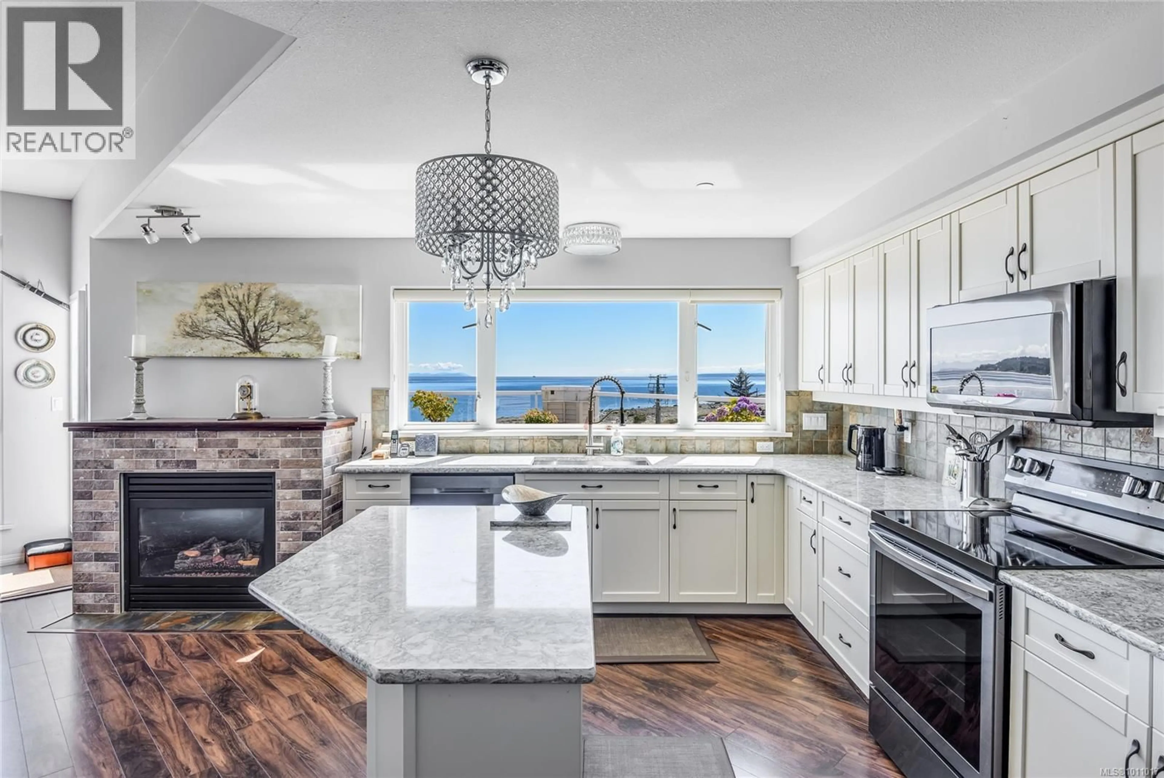 Open concept kitchen, ceramic/tile floor for 419 - 350 ISLAND HIGHWAY SOUTH, Campbell River British Columbia V9W1A5