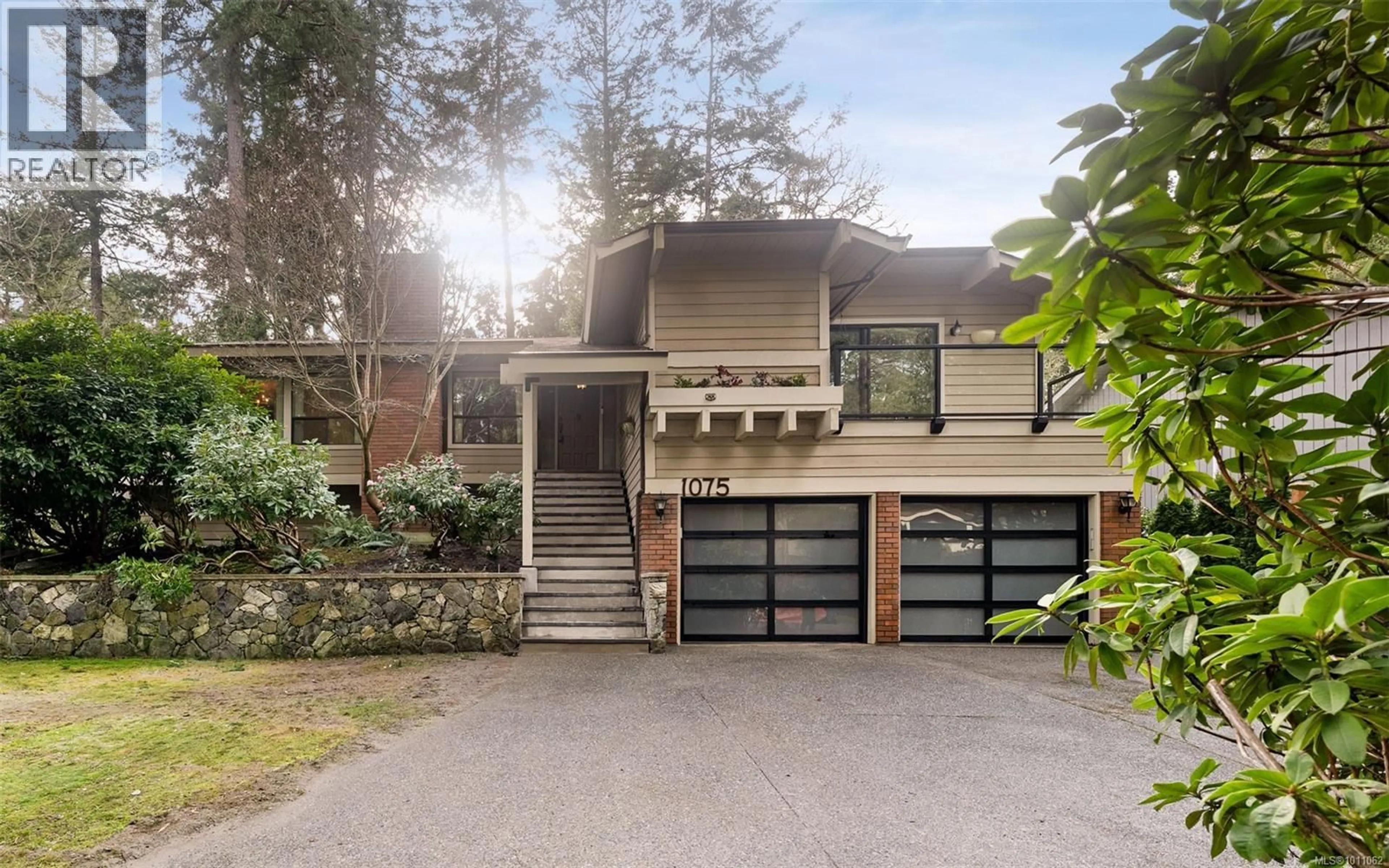 Home with brick exterior material, street for 1075 QUAILWOOD PLACE, Saanich British Columbia V8X4P7