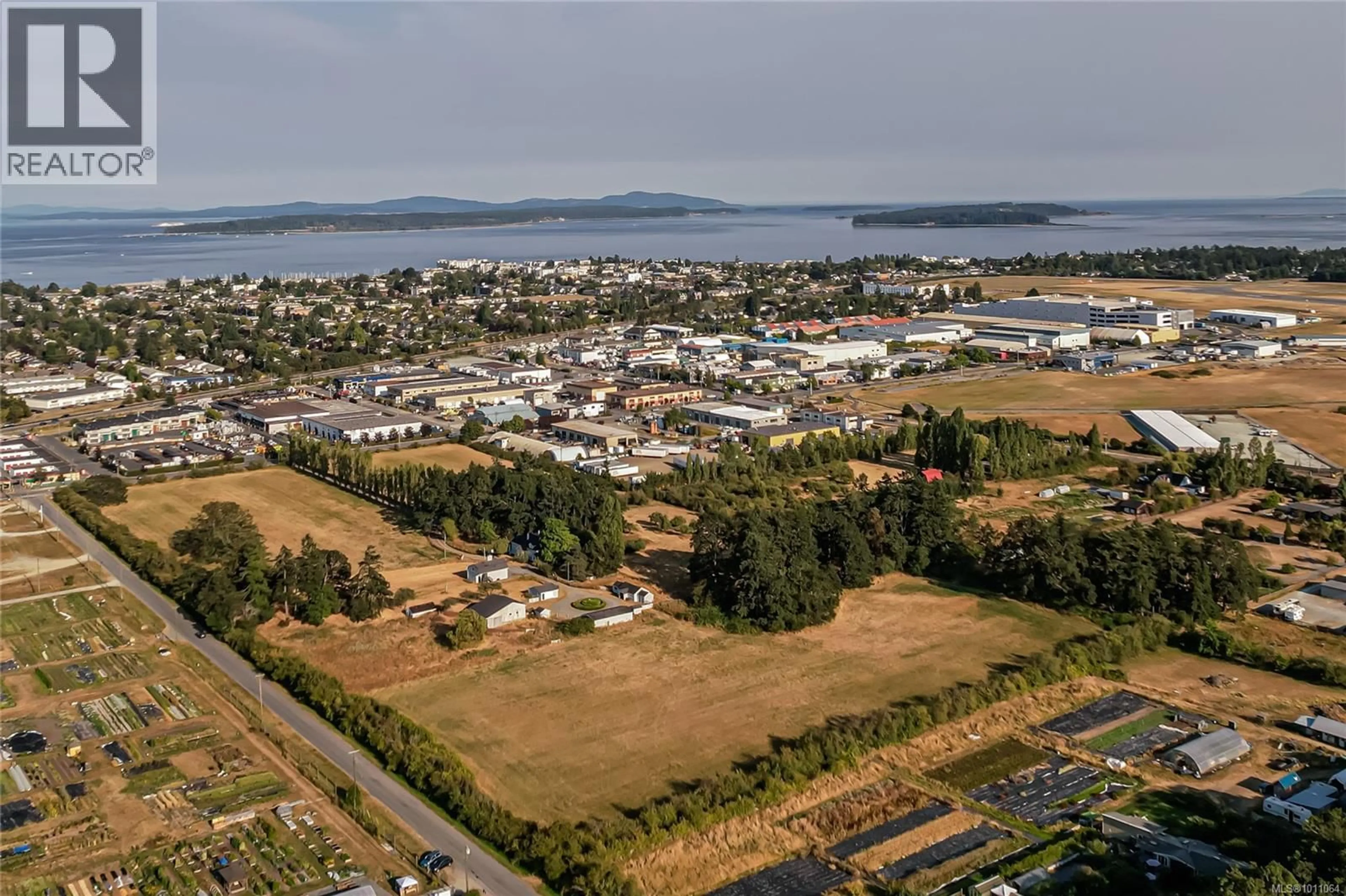 A pic from outside/outdoor area/front of a property/back of a property/a pic from drone, mountain view for 10202 MCDONALD PARK ROAD, North Saanich British Columbia V8L5X7