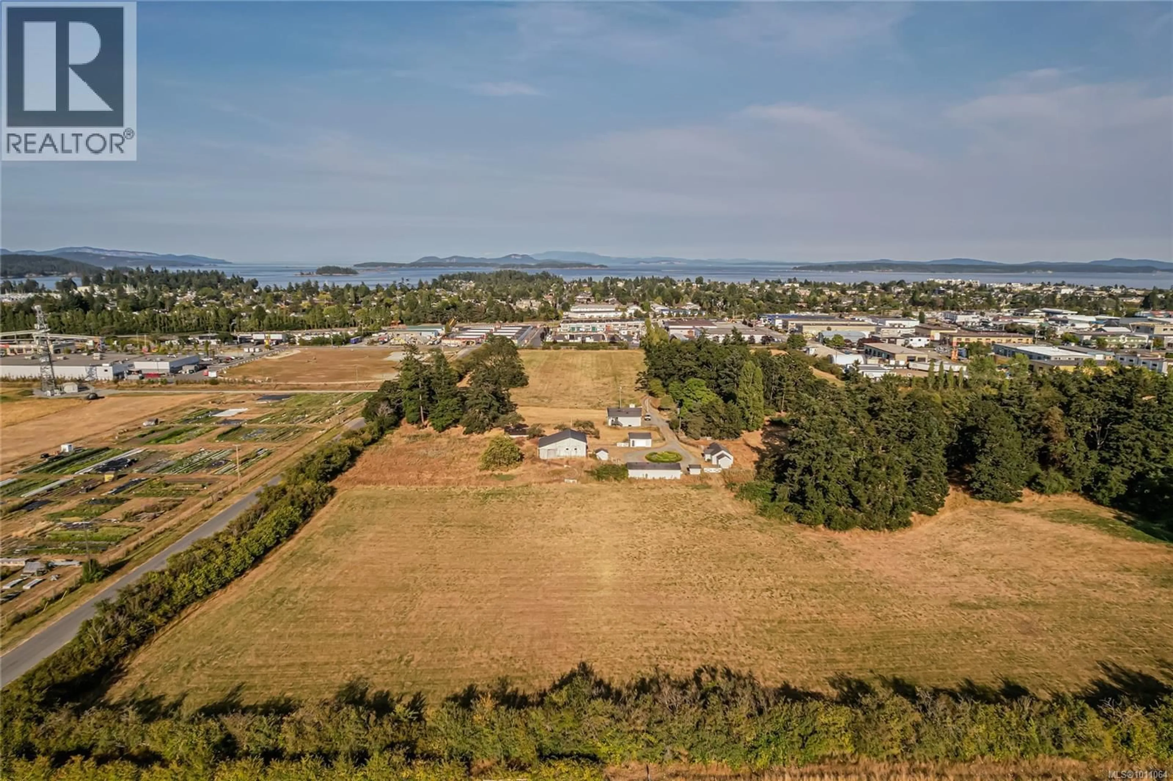 A pic from outside/outdoor area/front of a property/back of a property/a pic from drone, water/lake/river/ocean view for 10202 MCDONALD PARK ROAD, North Saanich British Columbia V8L5X7