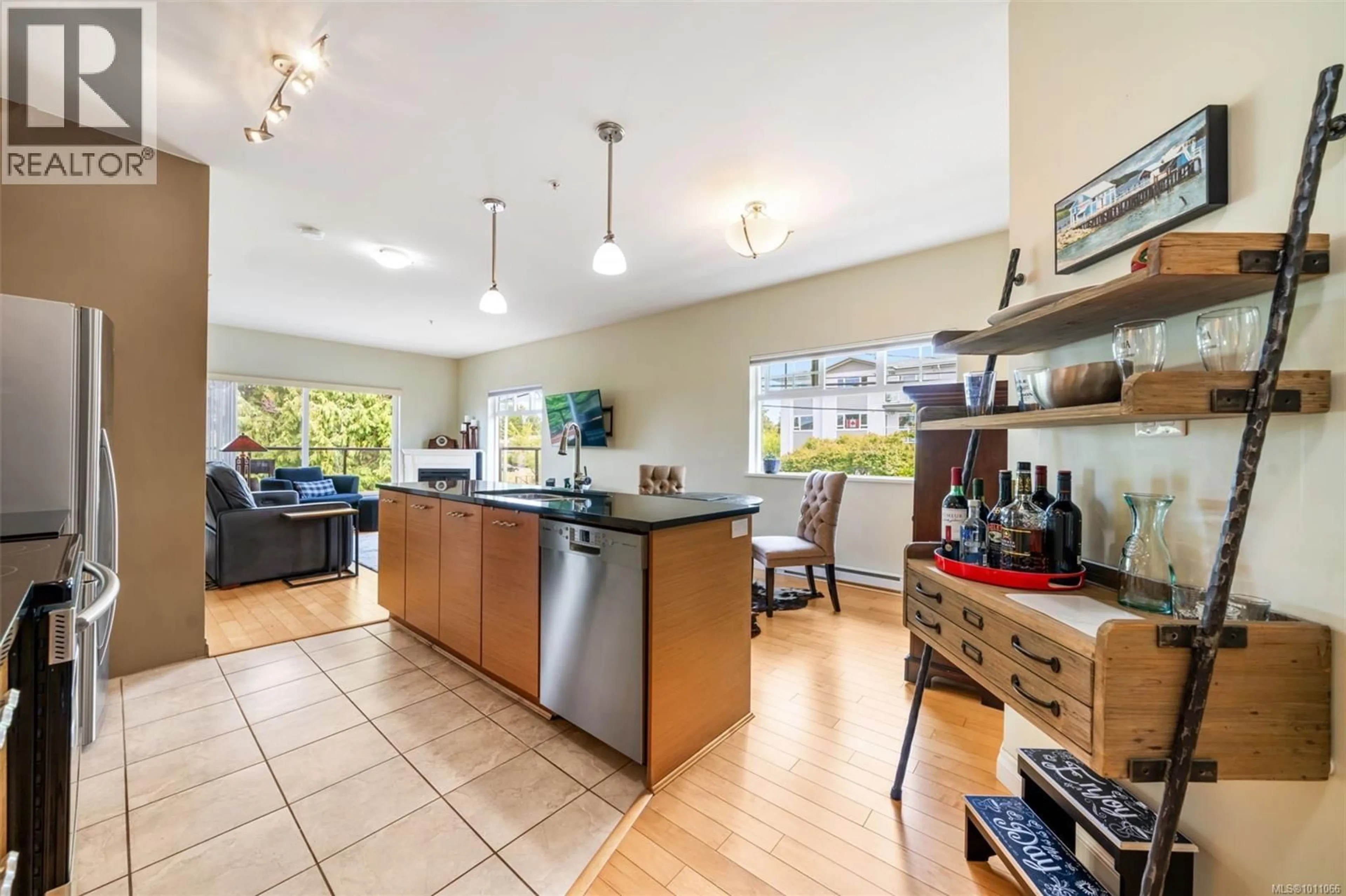 Open concept kitchen, ceramic/tile floor for 205 - 2380 BRETHOUR AVENUE, Sidney British Columbia V8L2A5