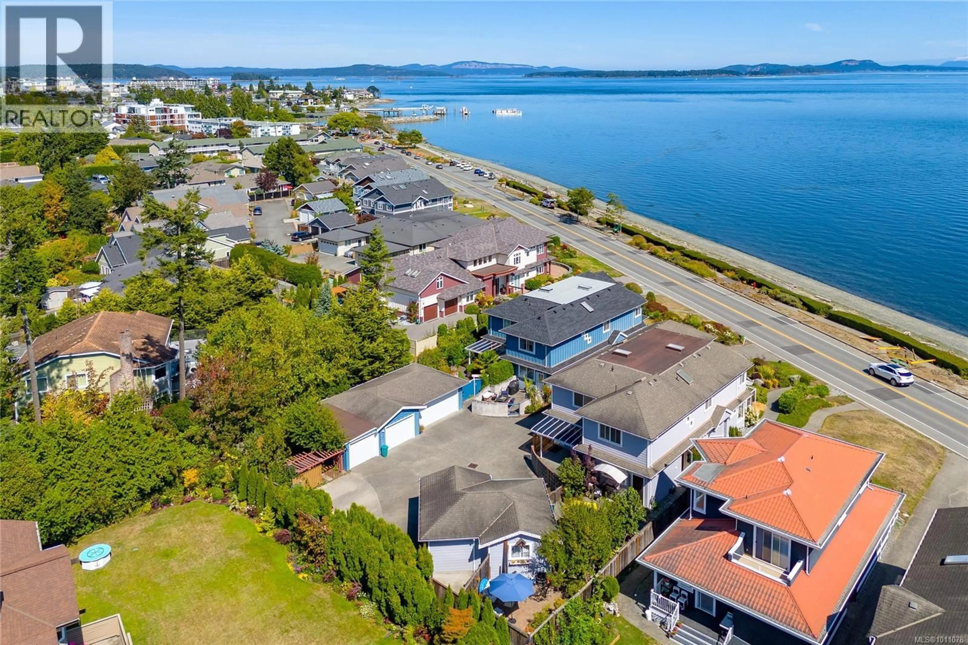 A pic from outside/outdoor area/front of a property/back of a property/a pic from drone, water/lake/river/ocean view for 9460 LOCHSIDE DRIVE, Sidney British Columbia V8L1N8
