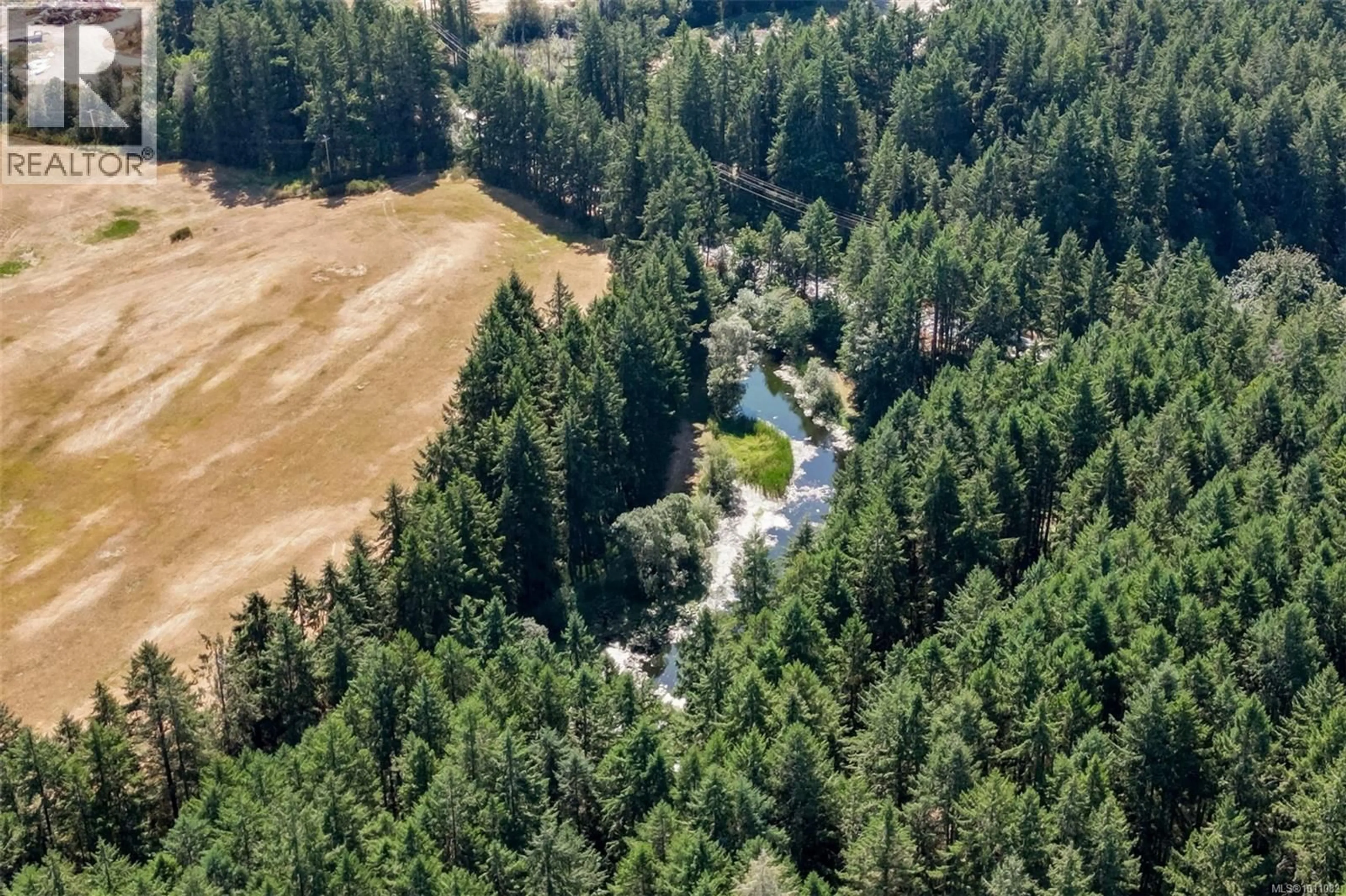 A pic from outside/outdoor area/front of a property/back of a property/a pic from drone, forest/trees view for 7003 MAYS ROAD, Duncan British Columbia V9L6A6