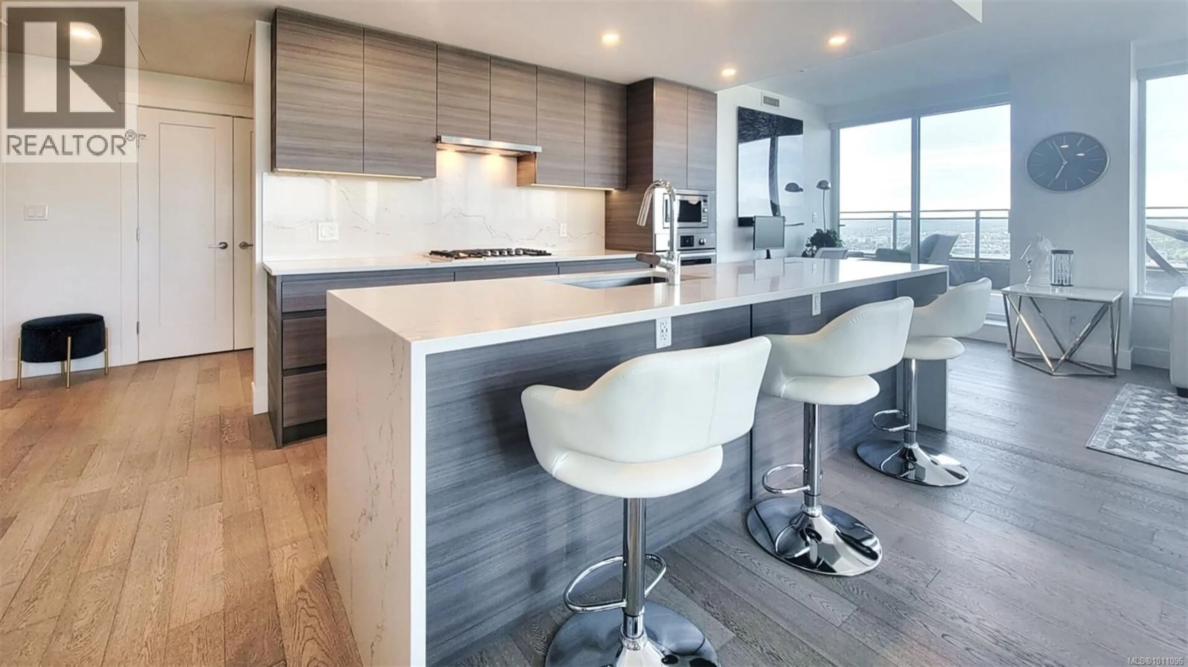 Contemporary kitchen, wood/laminate floor for 2104 - 777 HERALD STREET, Victoria British Columbia V8W1S5