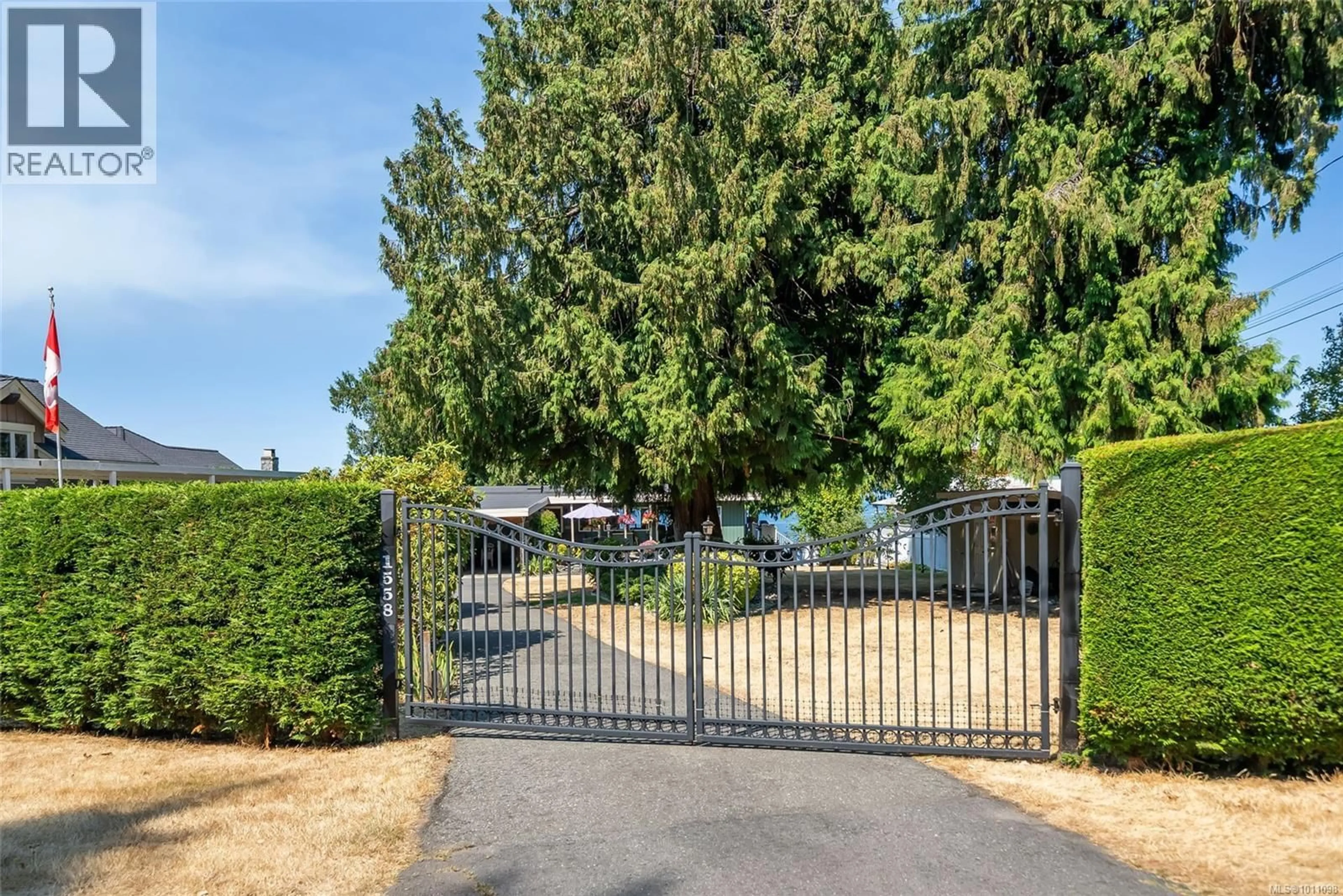 A pic from outside/outdoor area/front of a property/back of a property/a pic from drone, street for 1558 HAIDA WAY, Nanoose Bay British Columbia V9P9B5