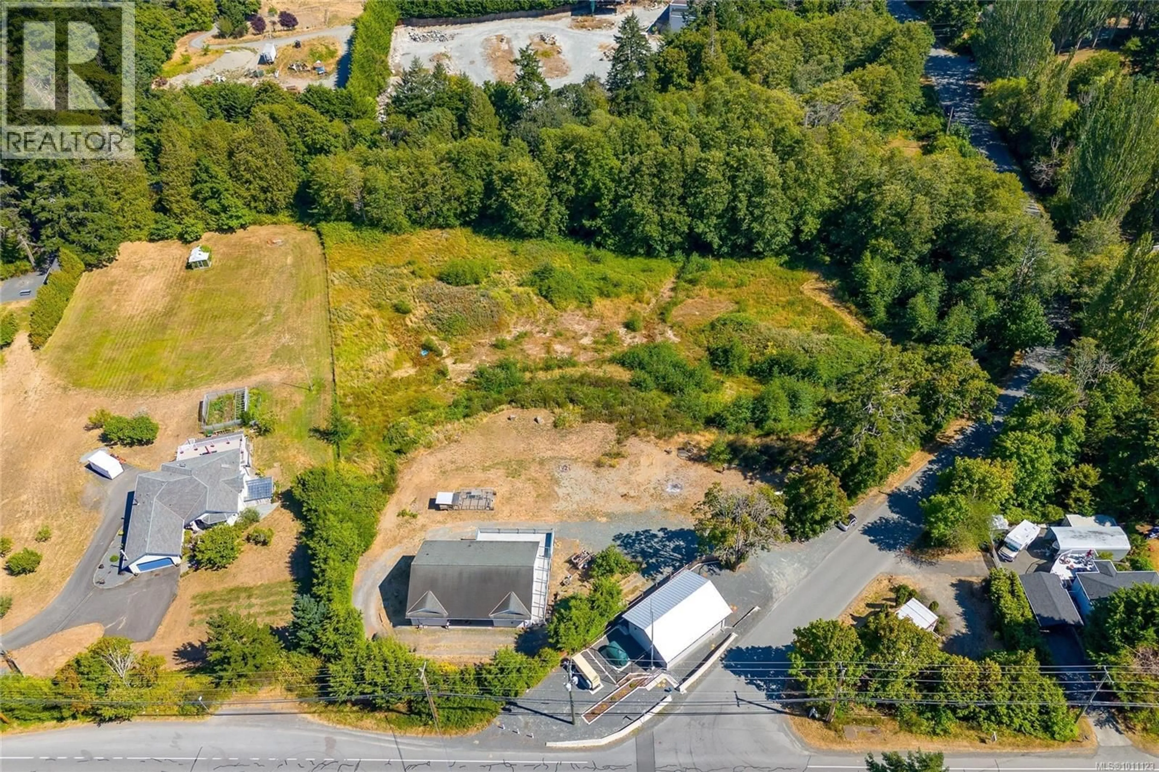 A pic from outside/outdoor area/front of a property/back of a property/a pic from drone, street for 681 LOMBARD DRIVE, Metchosin British Columbia V9C3Y9