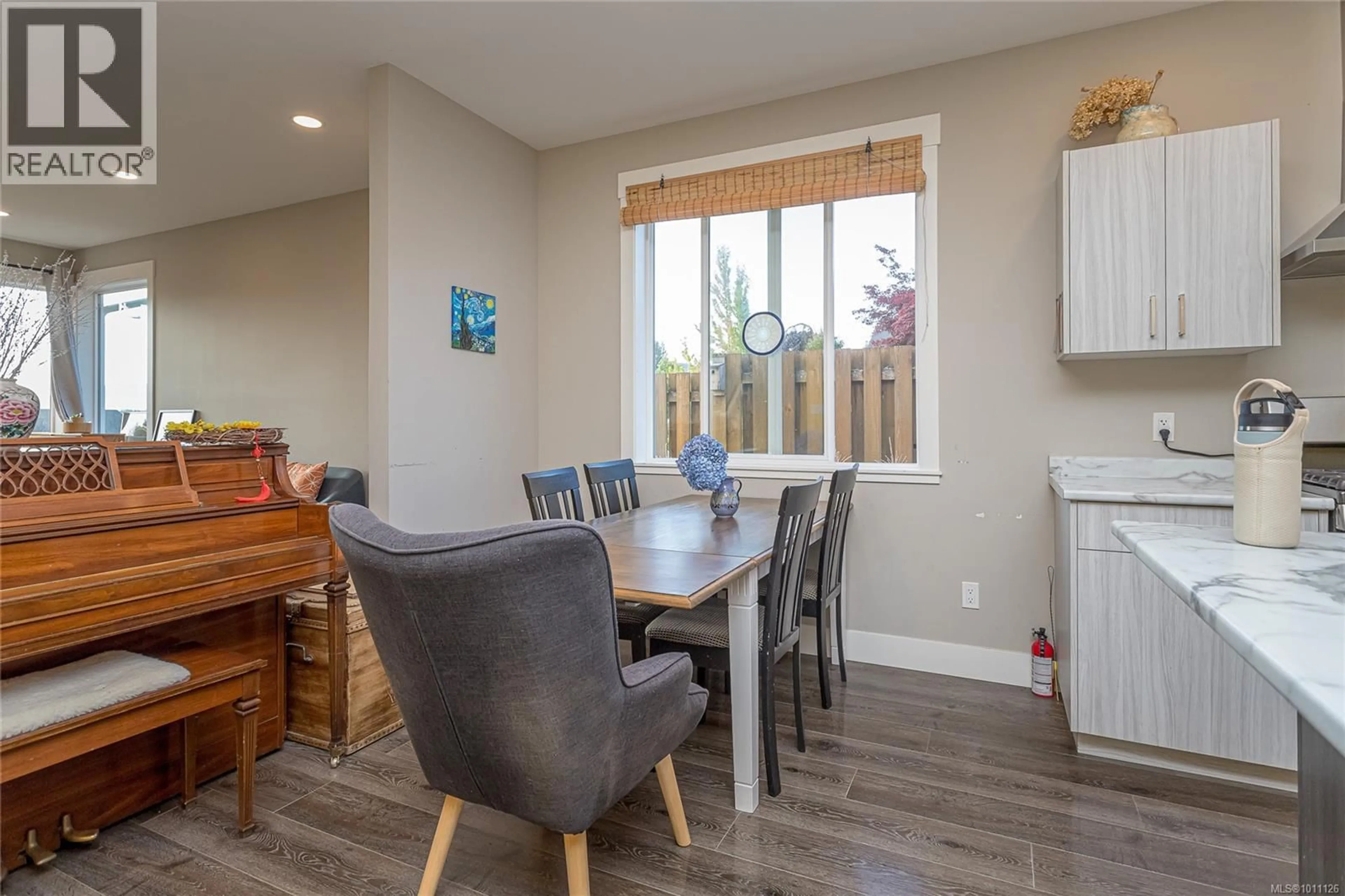 Dining room, wood/laminate floor for 1 - 1711 CHAPLIN STREET, Crofton British Columbia V0R1R0
