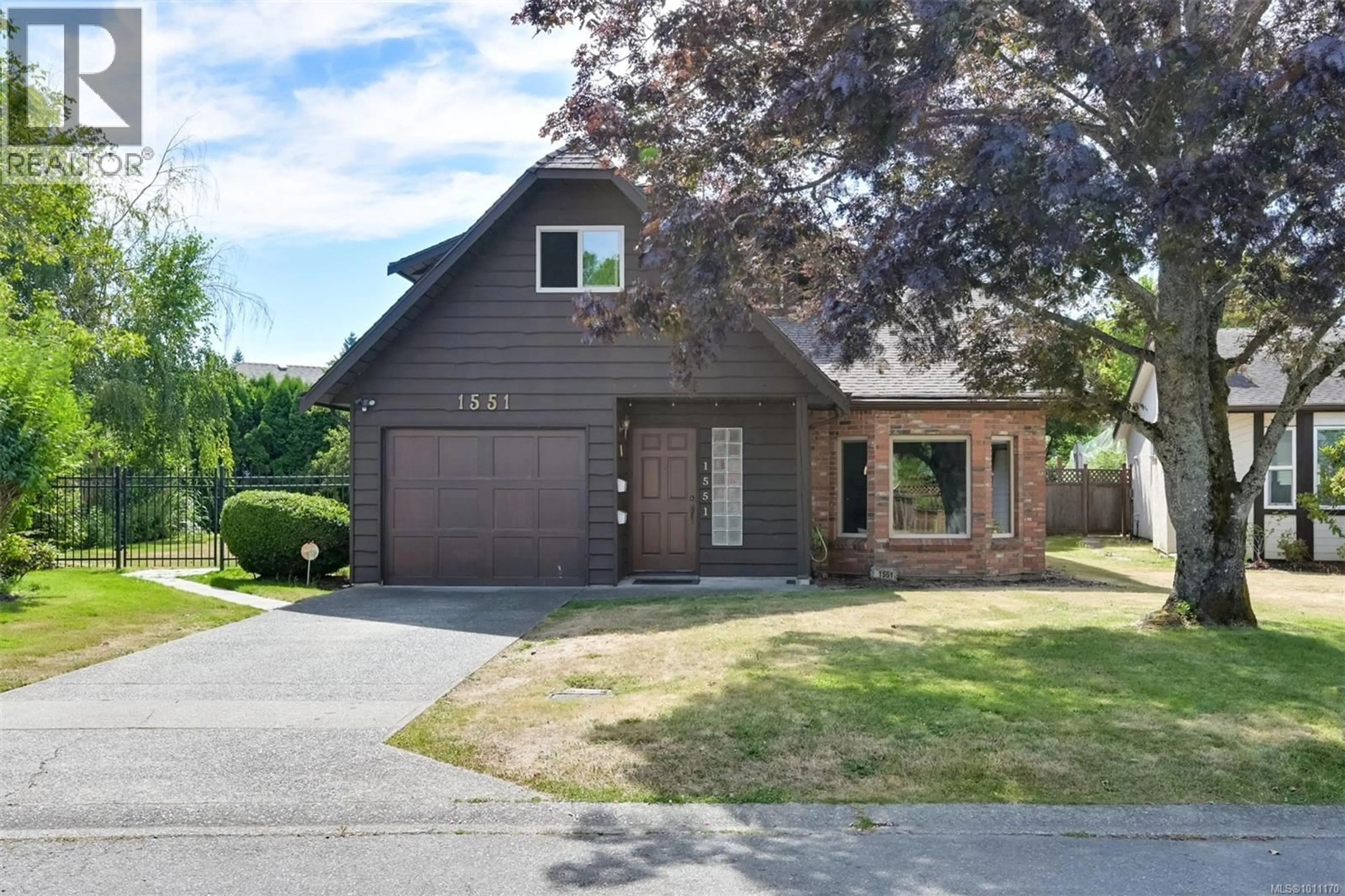 Home with brick exterior material, street for 1551 PRAIRIE STREET, Saanich British Columbia V8N4P4