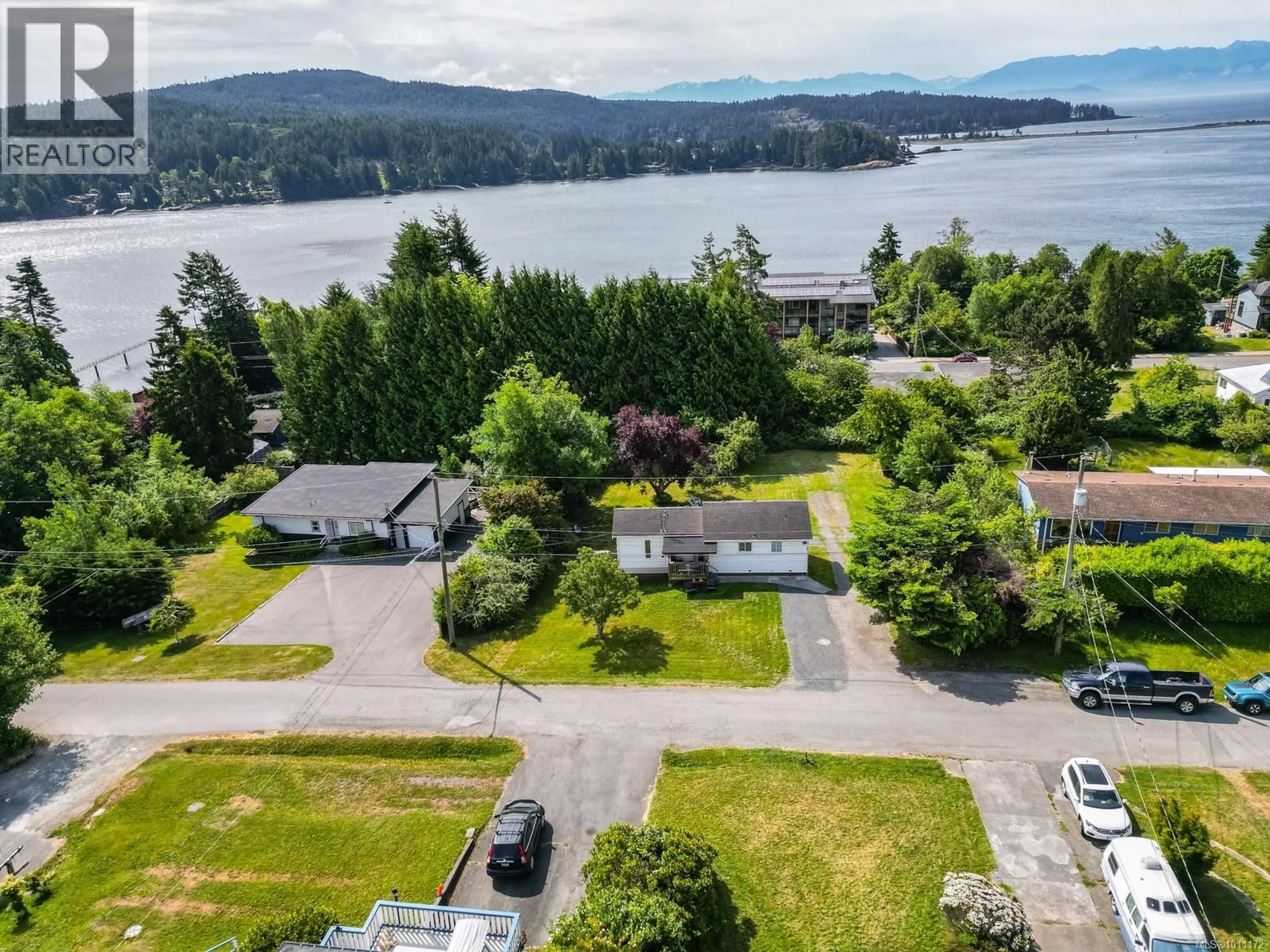 A pic from outside/outdoor area/front of a property/back of a property/a pic from drone, water/lake/river/ocean view for 6675 GOODMERE ROAD, Sooke British Columbia V7Z1H6