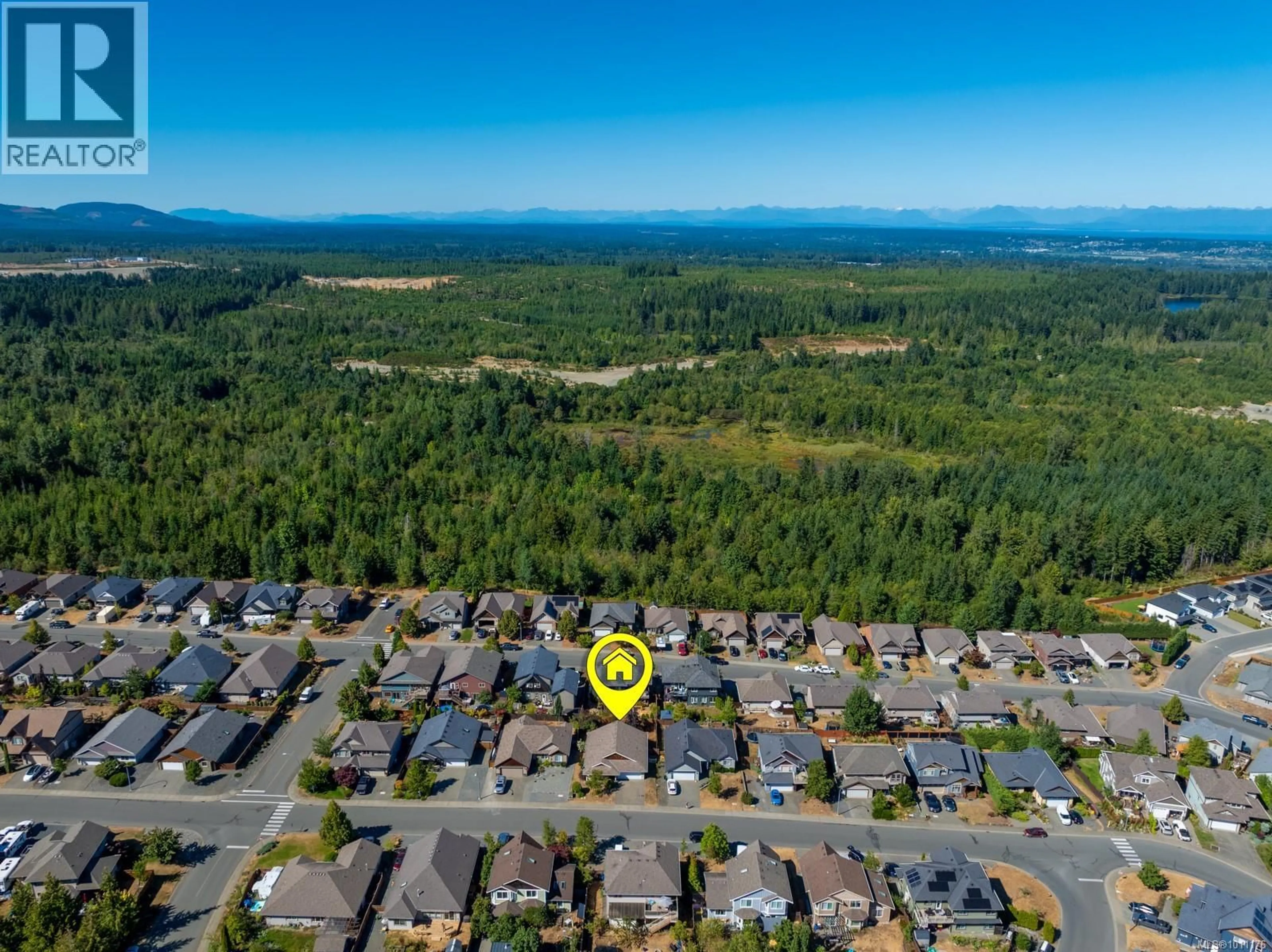 A pic from outside/outdoor area/front of a property/back of a property/a pic from drone, unknown for 2674 RYDAL AVENUE, Cumberland British Columbia V0R1S0