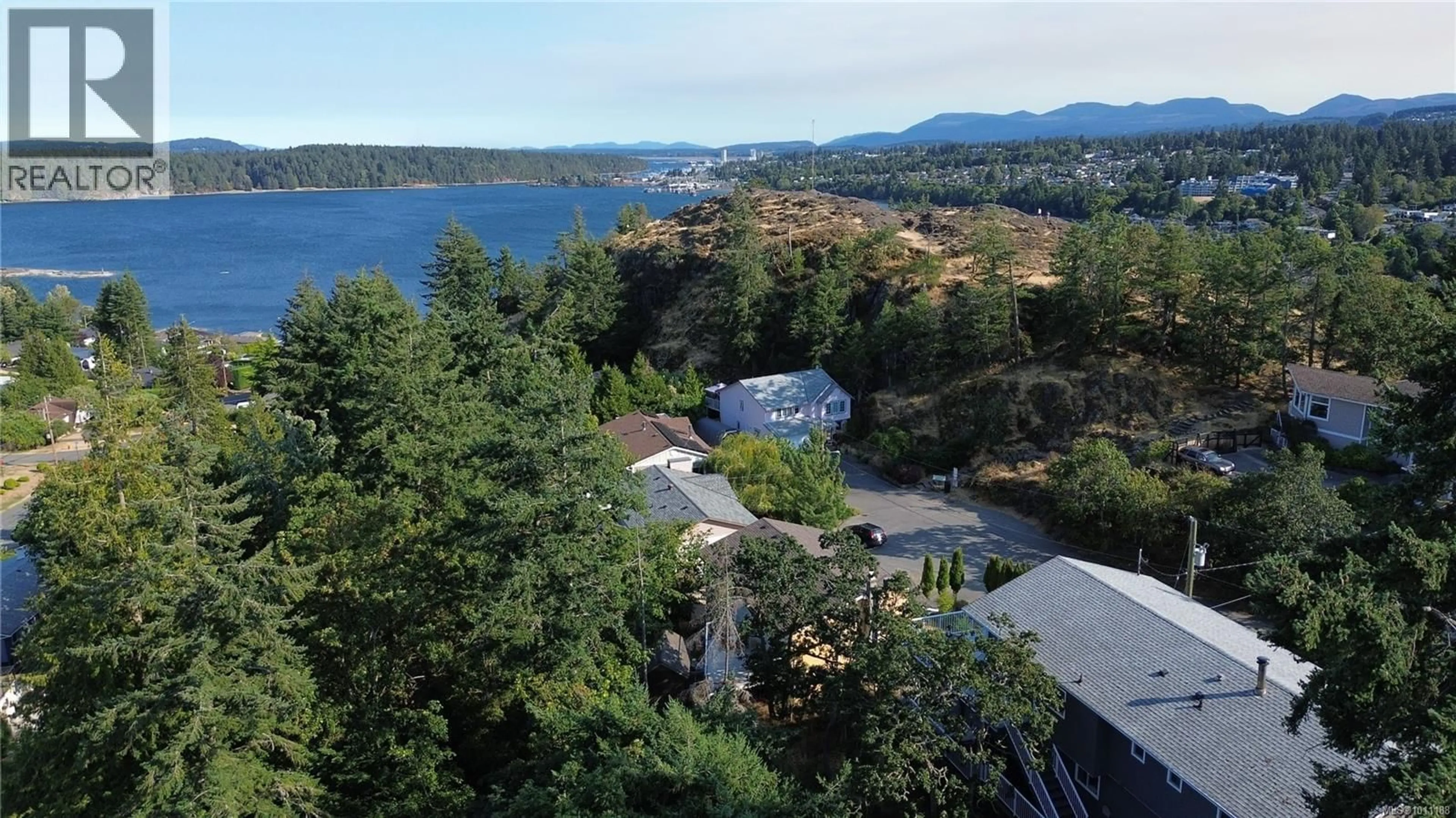 A pic from outside/outdoor area/front of a property/back of a property/a pic from drone, water/lake/river/ocean view for 3153 MARION WAY, Nanaimo British Columbia V9T3Z8