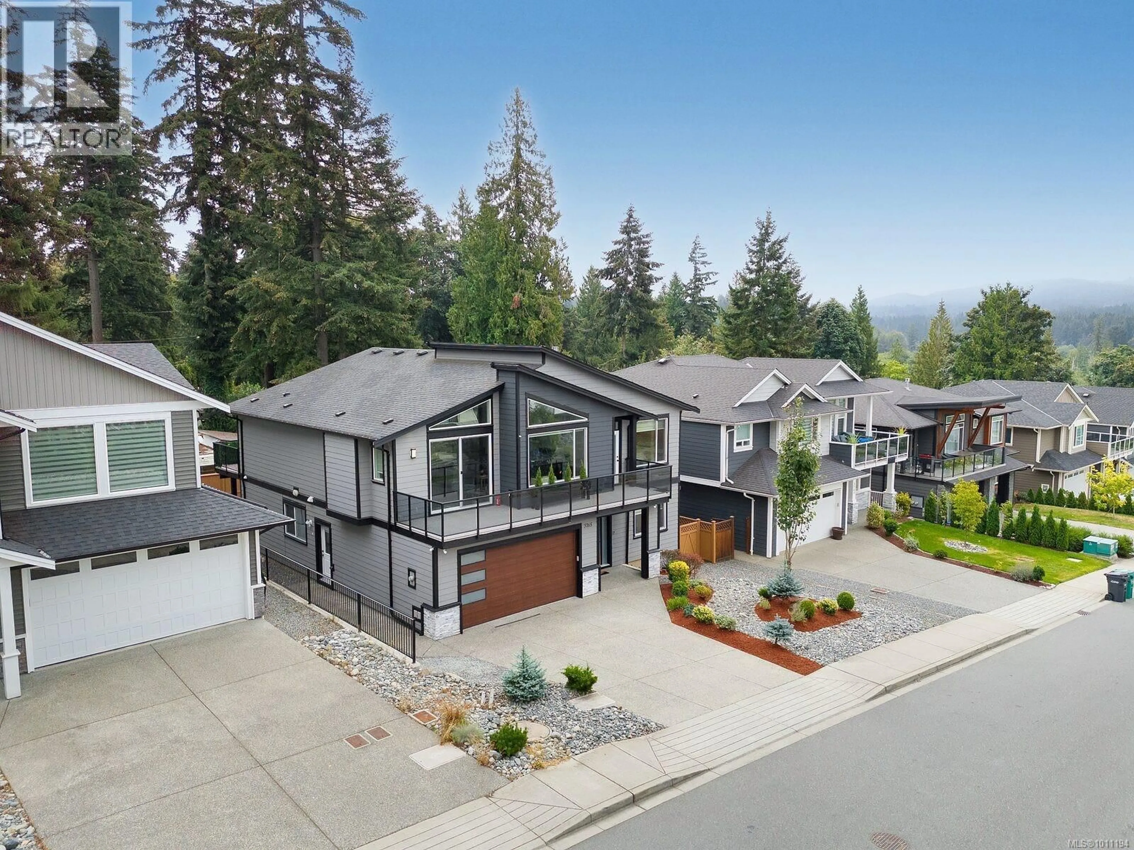 A pic from outside/outdoor area/front of a property/back of a property/a pic from drone, mountain view for 3765 MARJORIE WAY, Nanaimo British Columbia V9T0K3