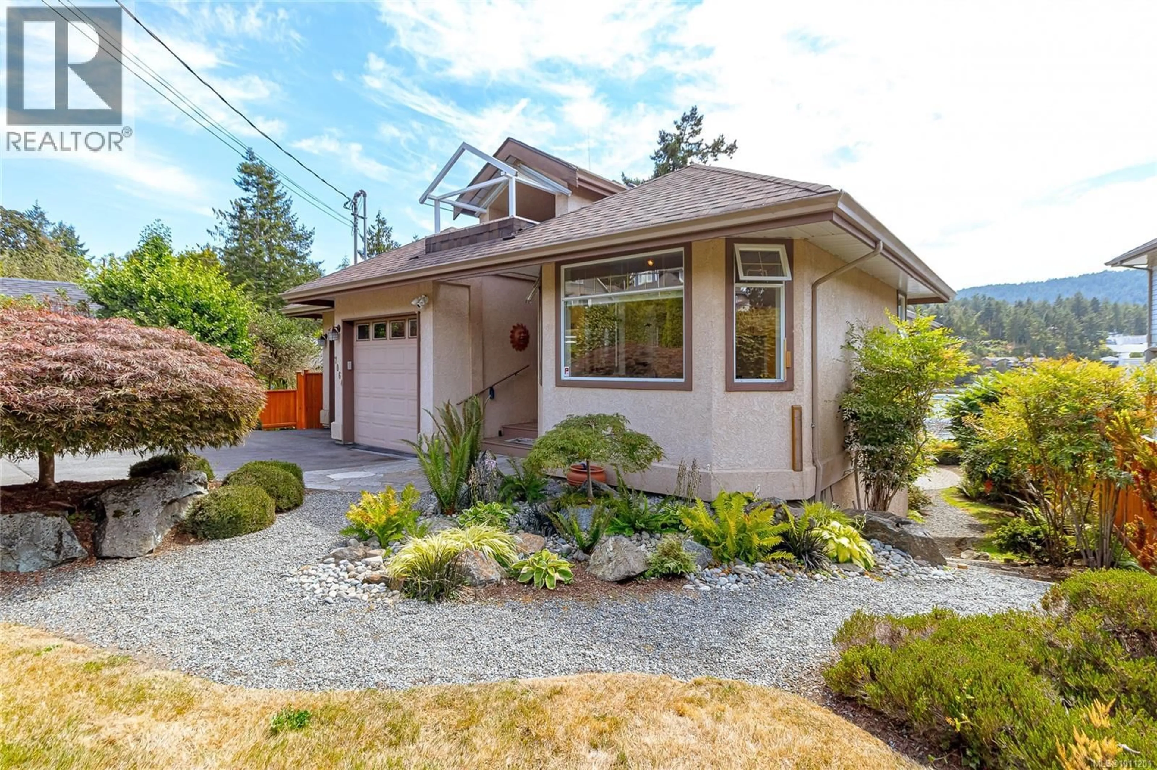 Home with vinyl exterior material, street for 7064 BRENTWOOD DRIVE, Central Saanich British Columbia V8M1B6