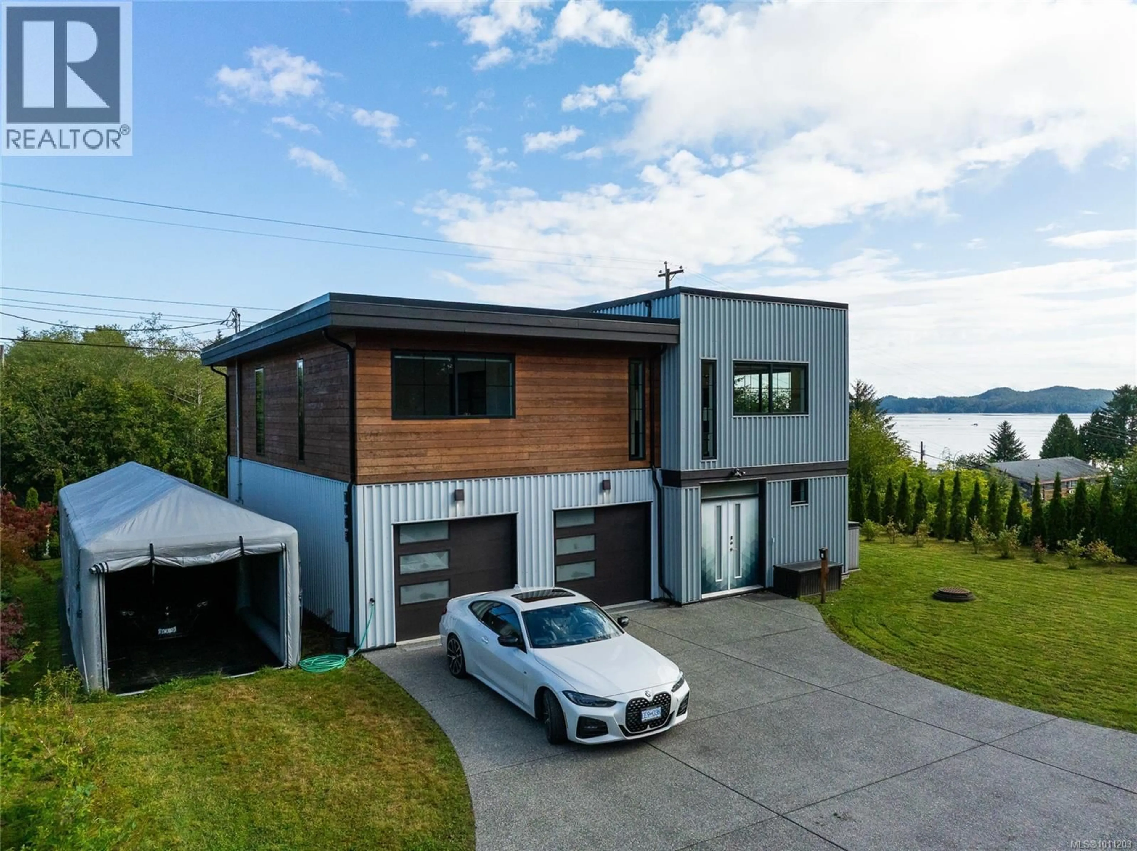 A pic from outside/outdoor area/front of a property/back of a property/a pic from drone, water/lake/river/ocean view for 7215 RUPERT STREET, Port Hardy British Columbia V0N2P0