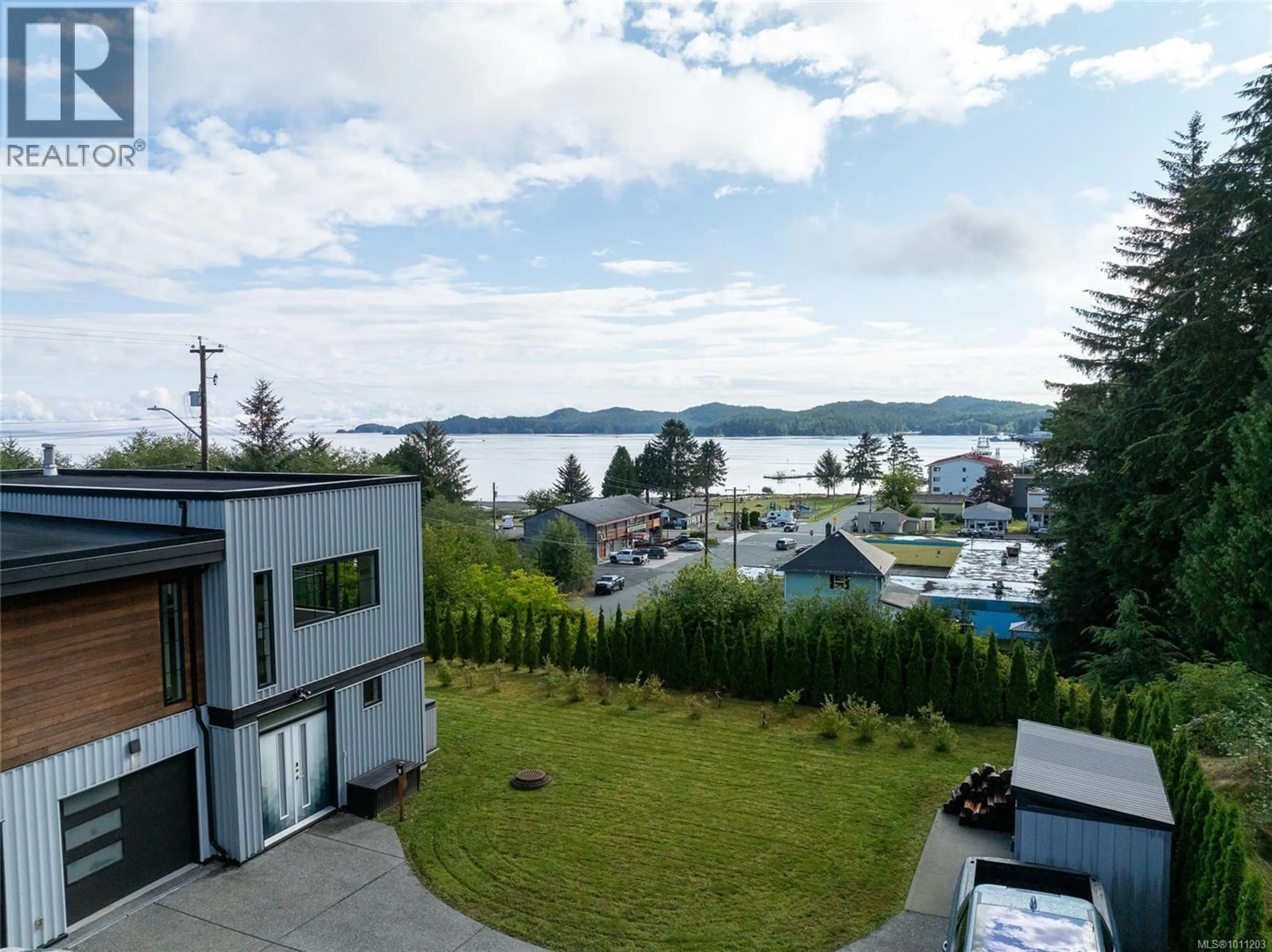 A pic from outside/outdoor area/front of a property/back of a property/a pic from drone, water/lake/river/ocean view for 7215 RUPERT STREET, Port Hardy British Columbia V0N2P0