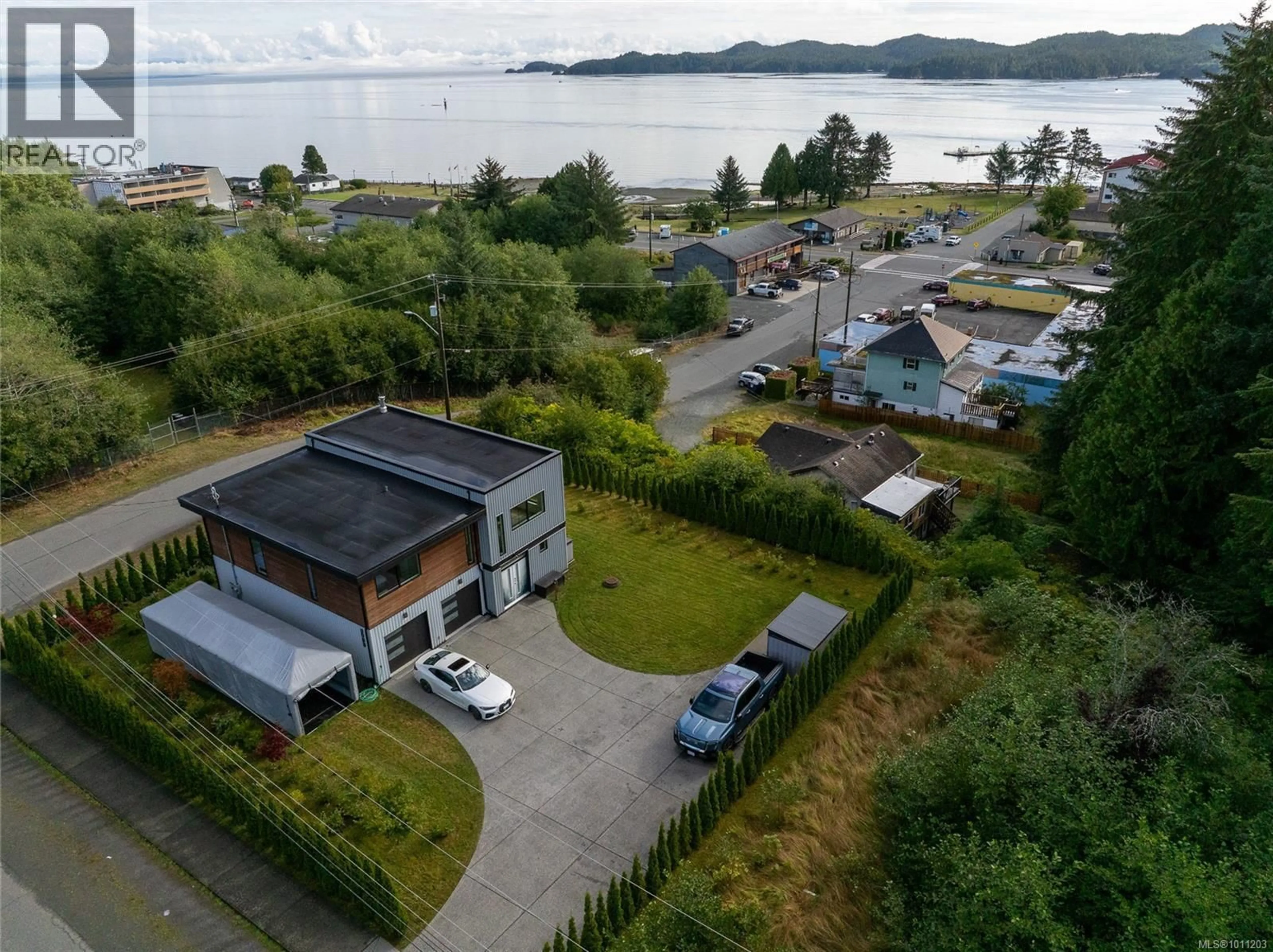 A pic from outside/outdoor area/front of a property/back of a property/a pic from drone, water/lake/river/ocean view for 7215 RUPERT STREET, Port Hardy British Columbia V0N2P0