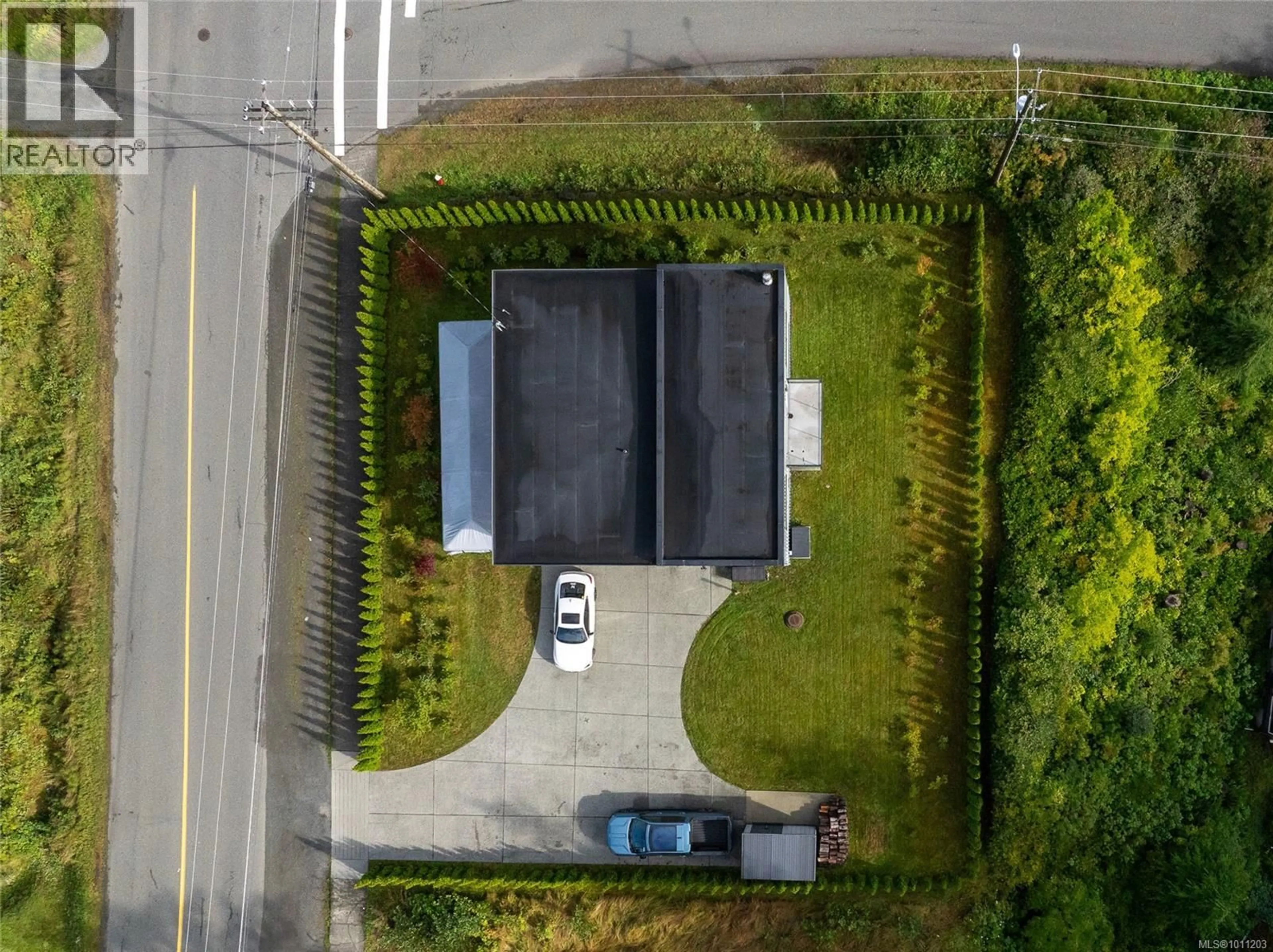 A pic from outside/outdoor area/front of a property/back of a property/a pic from drone, street for 7215 RUPERT STREET, Port Hardy British Columbia V0N2P0