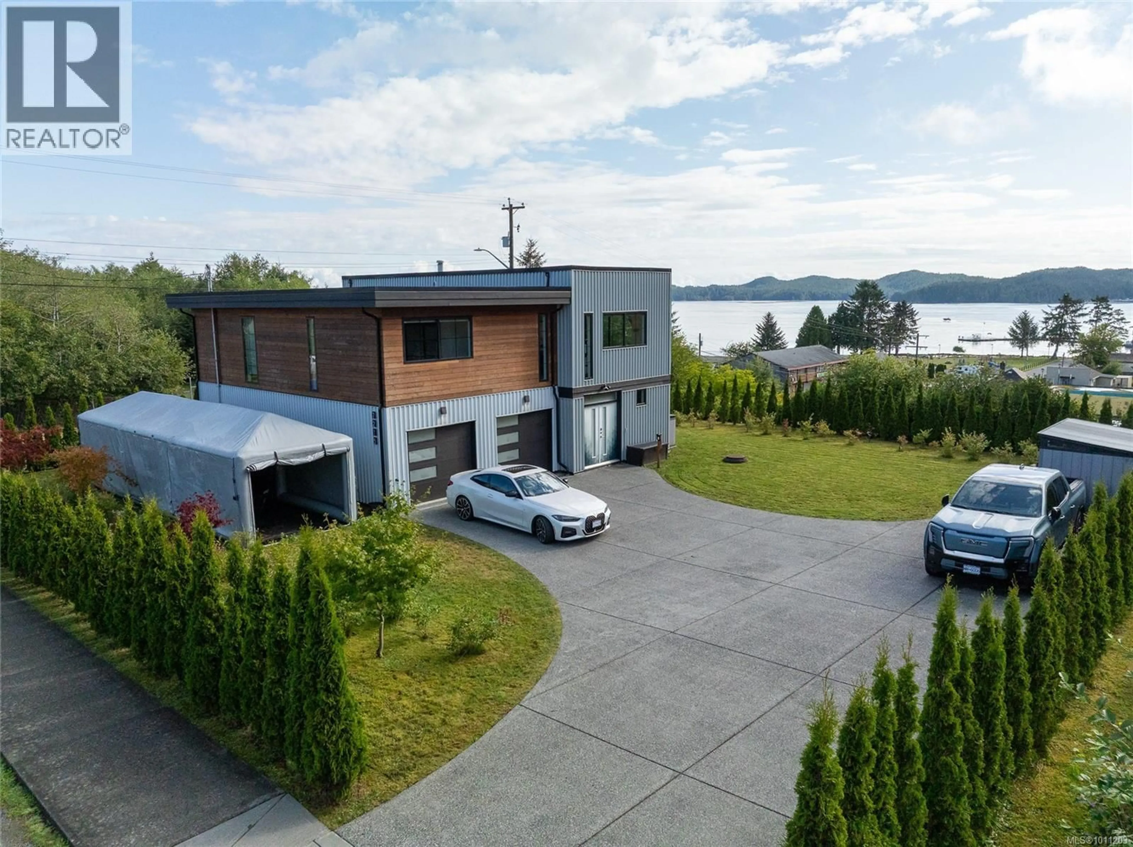 A pic from outside/outdoor area/front of a property/back of a property/a pic from drone, water/lake/river/ocean view for 7215 RUPERT STREET, Port Hardy British Columbia V0N2P0