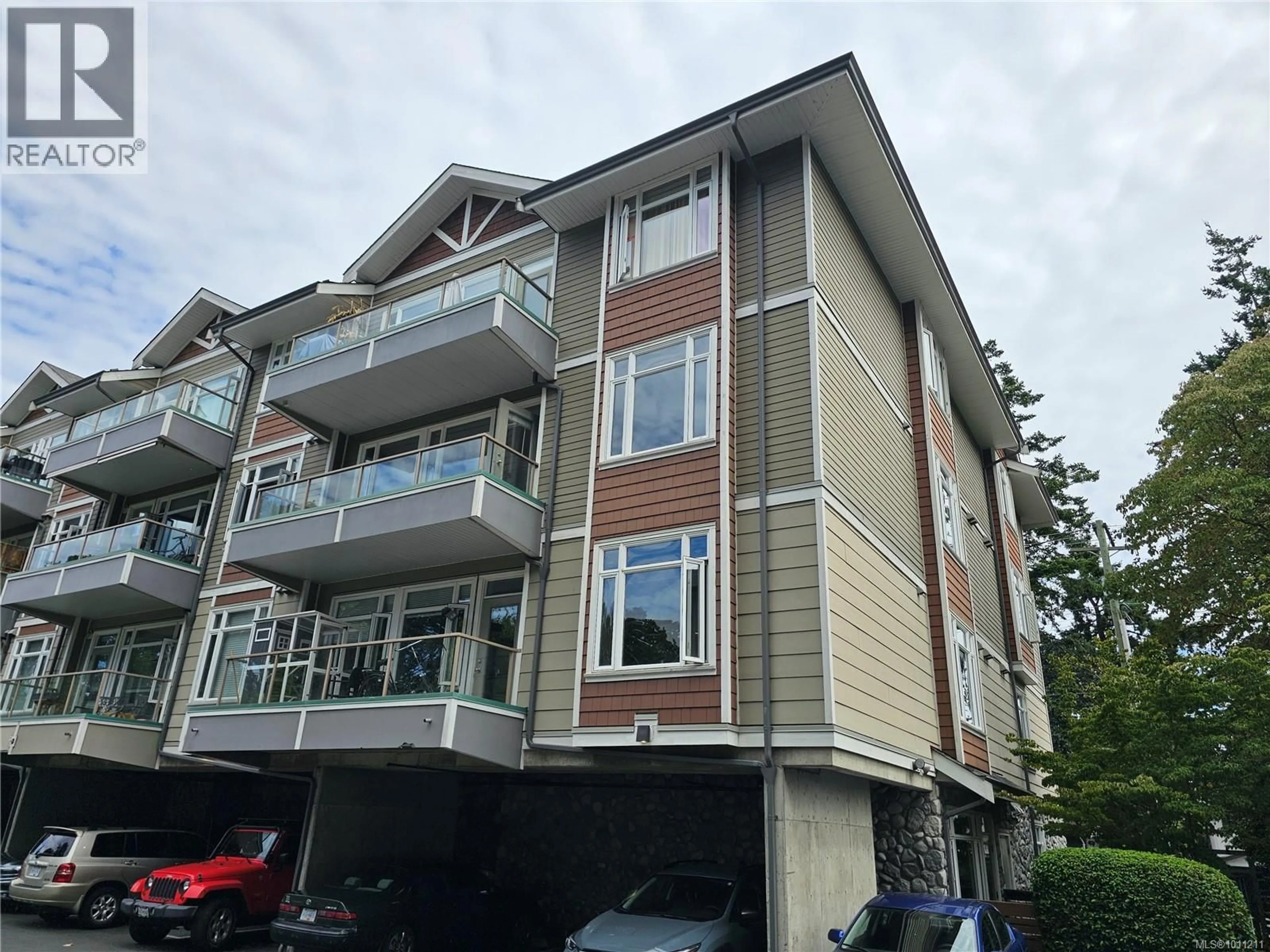 A pic from outside/outdoor area/front of a property/back of a property/a pic from drone, building for 306 - 2706 PEATT ROAD, Langford British Columbia V9B3V3