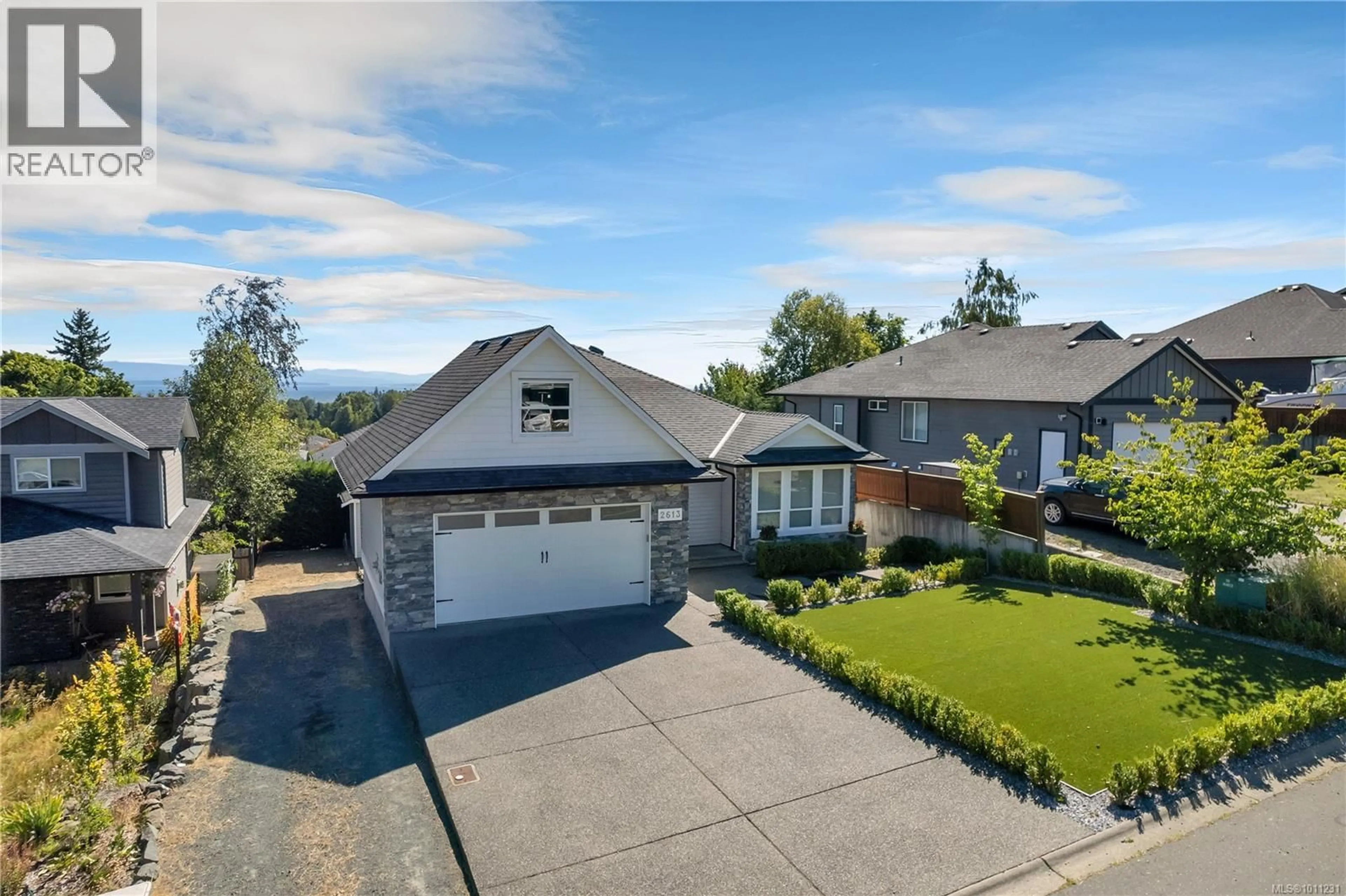 A pic from outside/outdoor area/front of a property/back of a property/a pic from drone, street for 2613 SUNDERLAND ROAD, Campbell River British Columbia V9H0C9