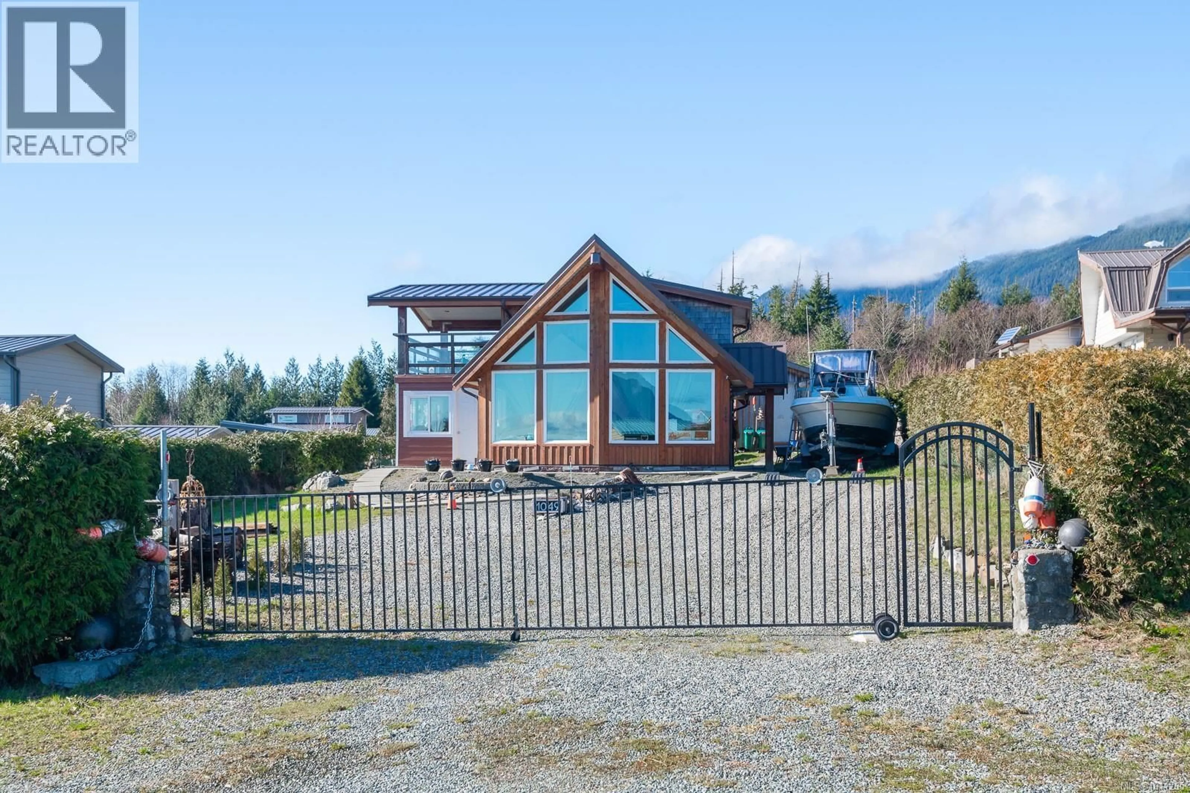A pic from outside/outdoor area/front of a property/back of a property/a pic from drone, mountain view for 1049 SIXTH AVENUE, Ucluelet British Columbia V0R3A0
